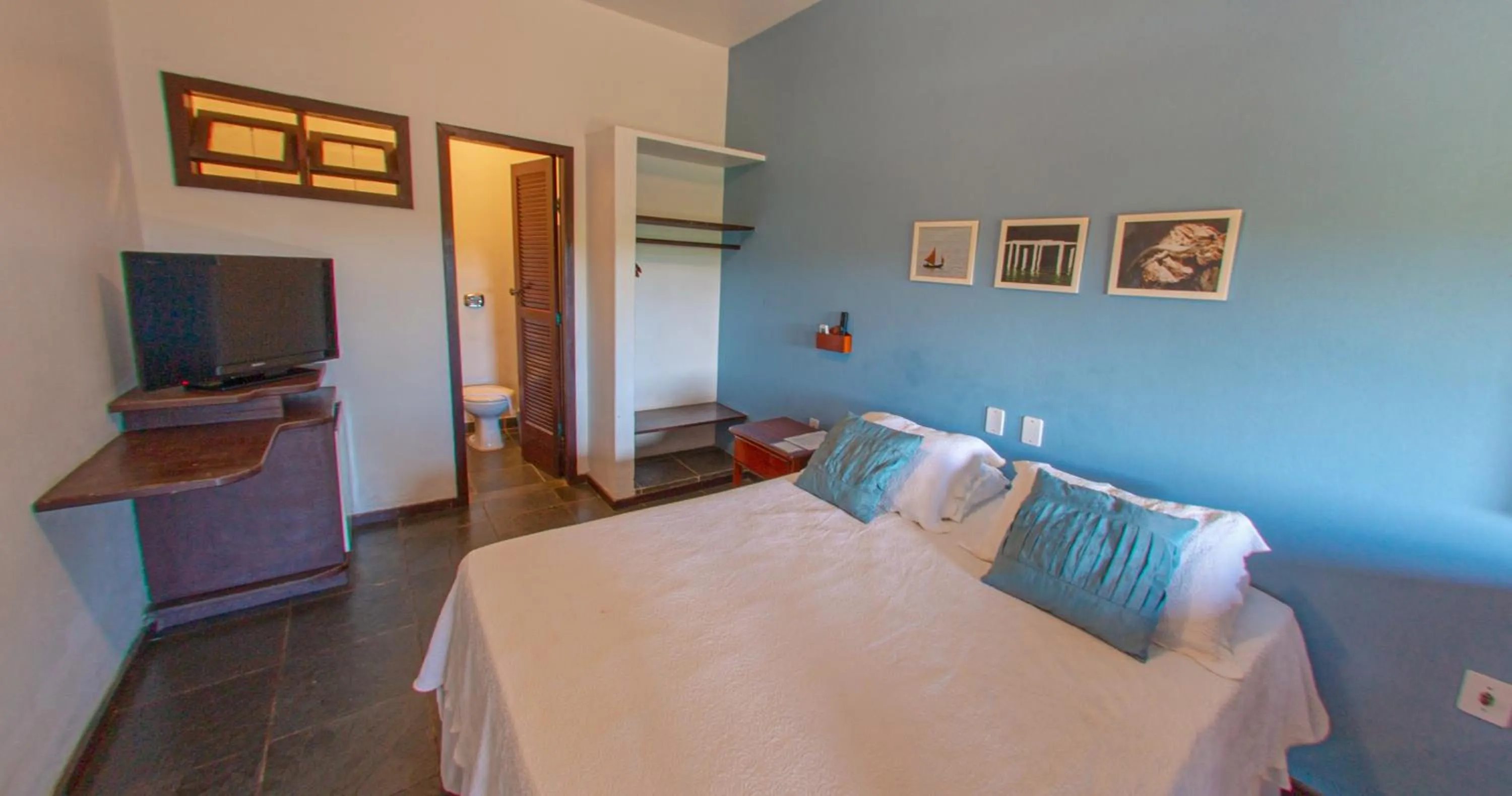 Bed in Pousada Canto do Rio