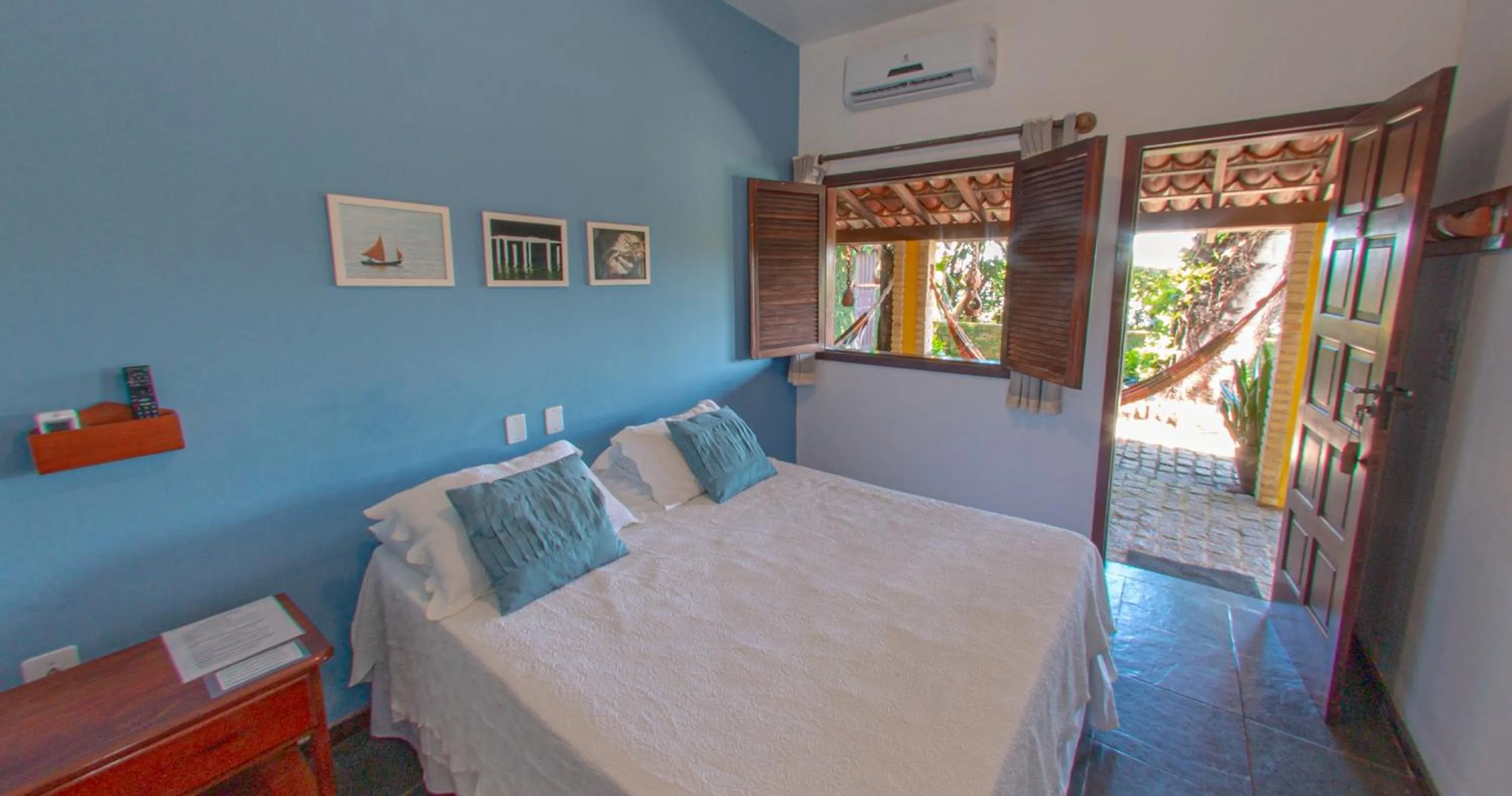 Bed in Pousada Canto do Rio