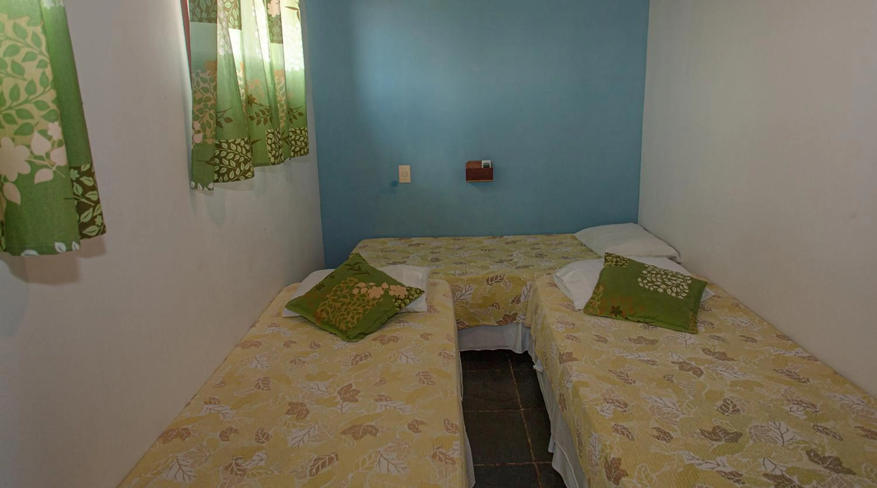 Bed in Pousada Canto do Rio
