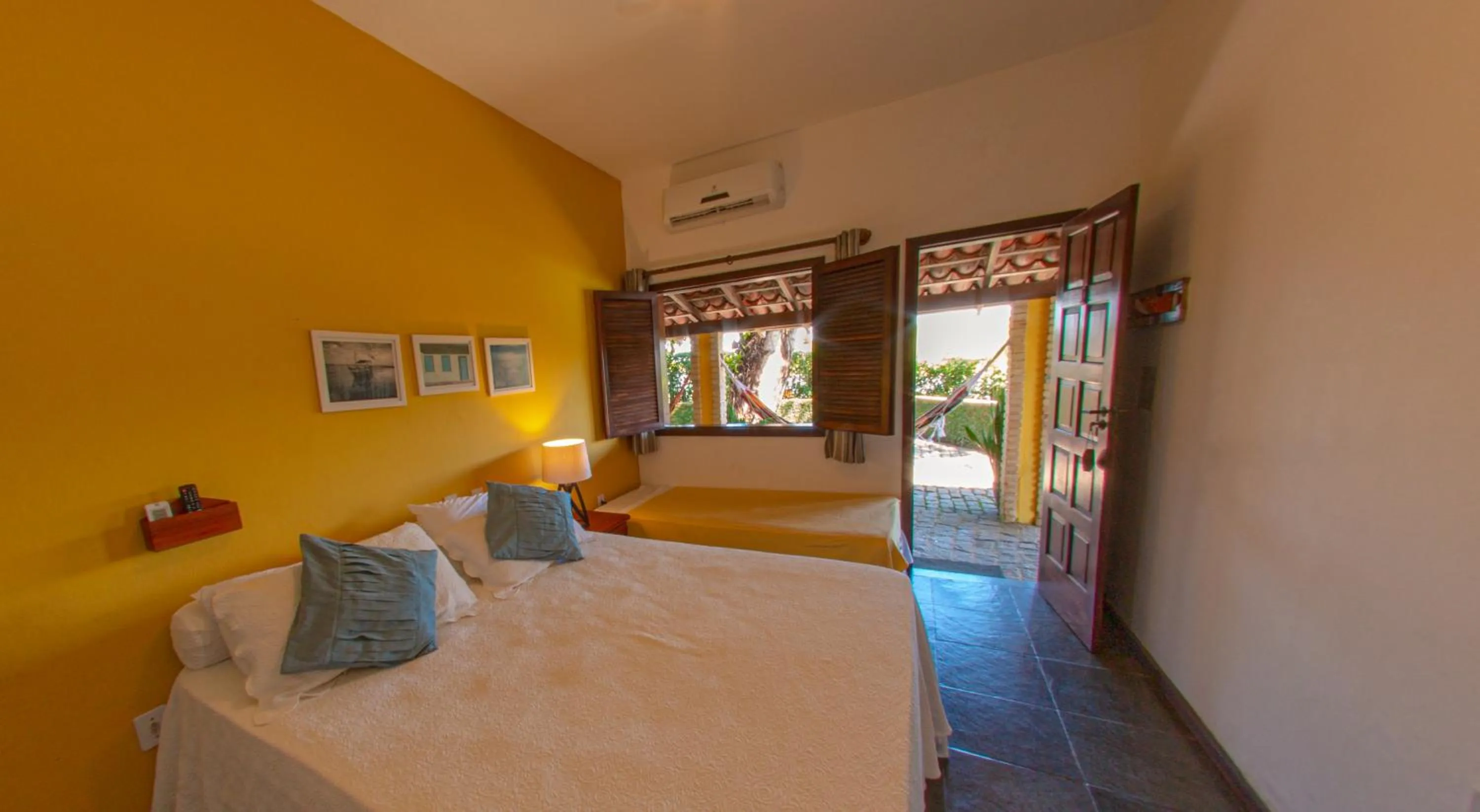 Bed in Pousada Canto do Rio