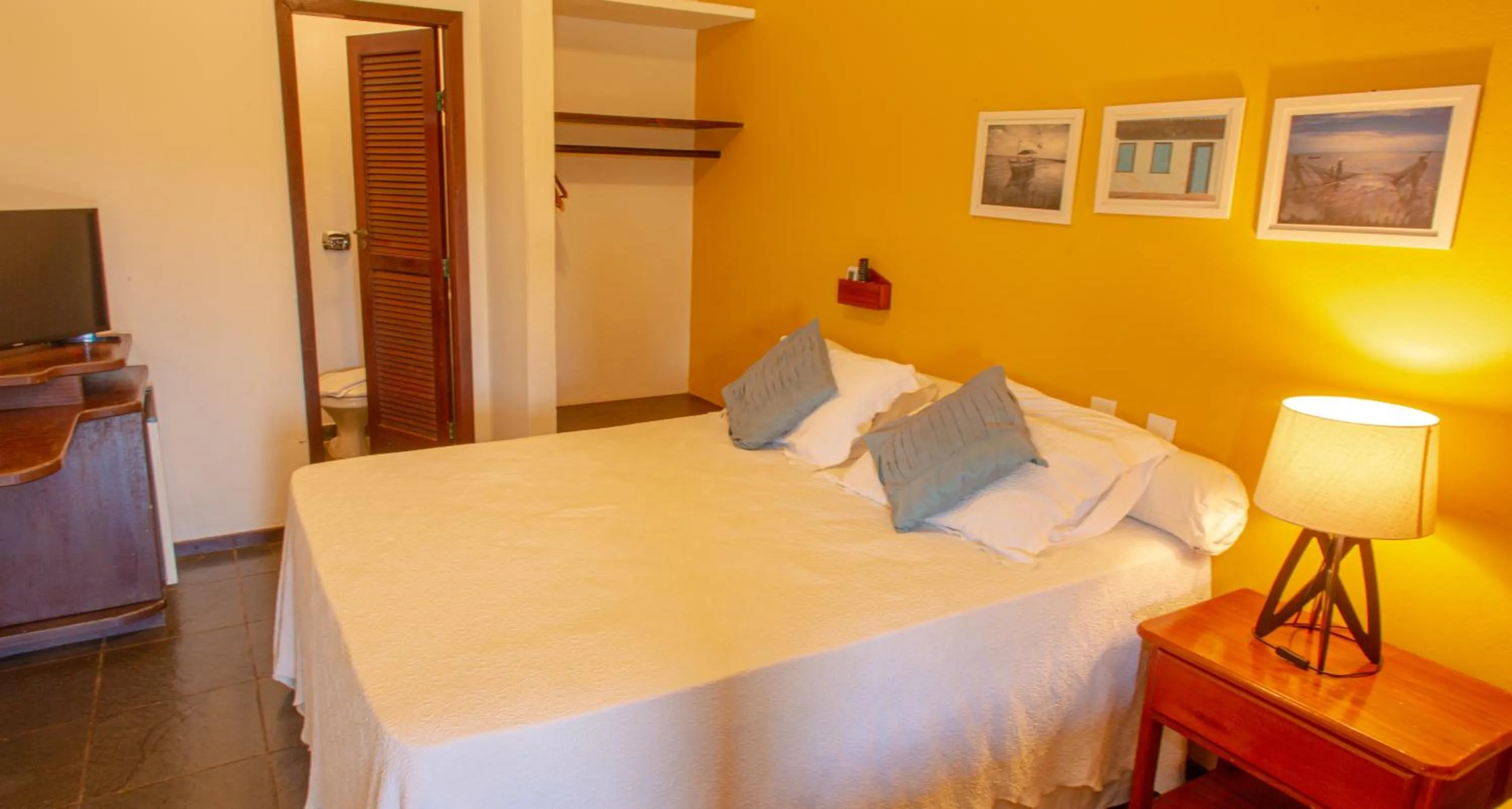 Bed in Pousada Canto do Rio