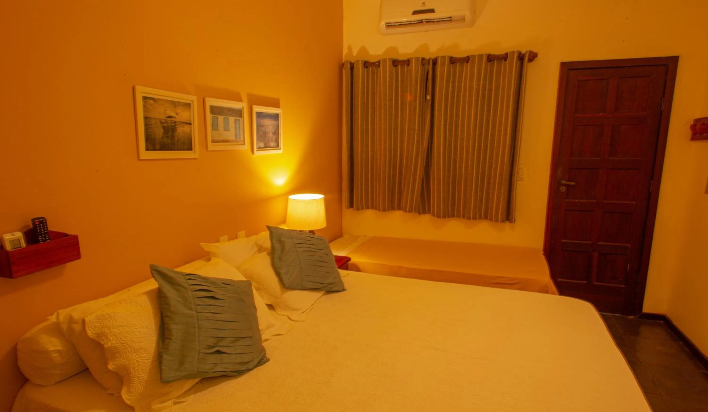 Bed in Pousada Canto do Rio