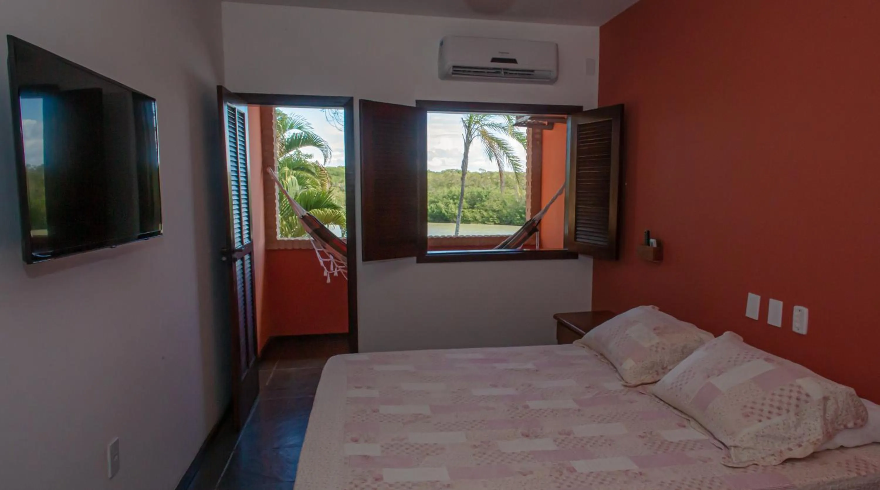 Bed in Pousada Canto do Rio