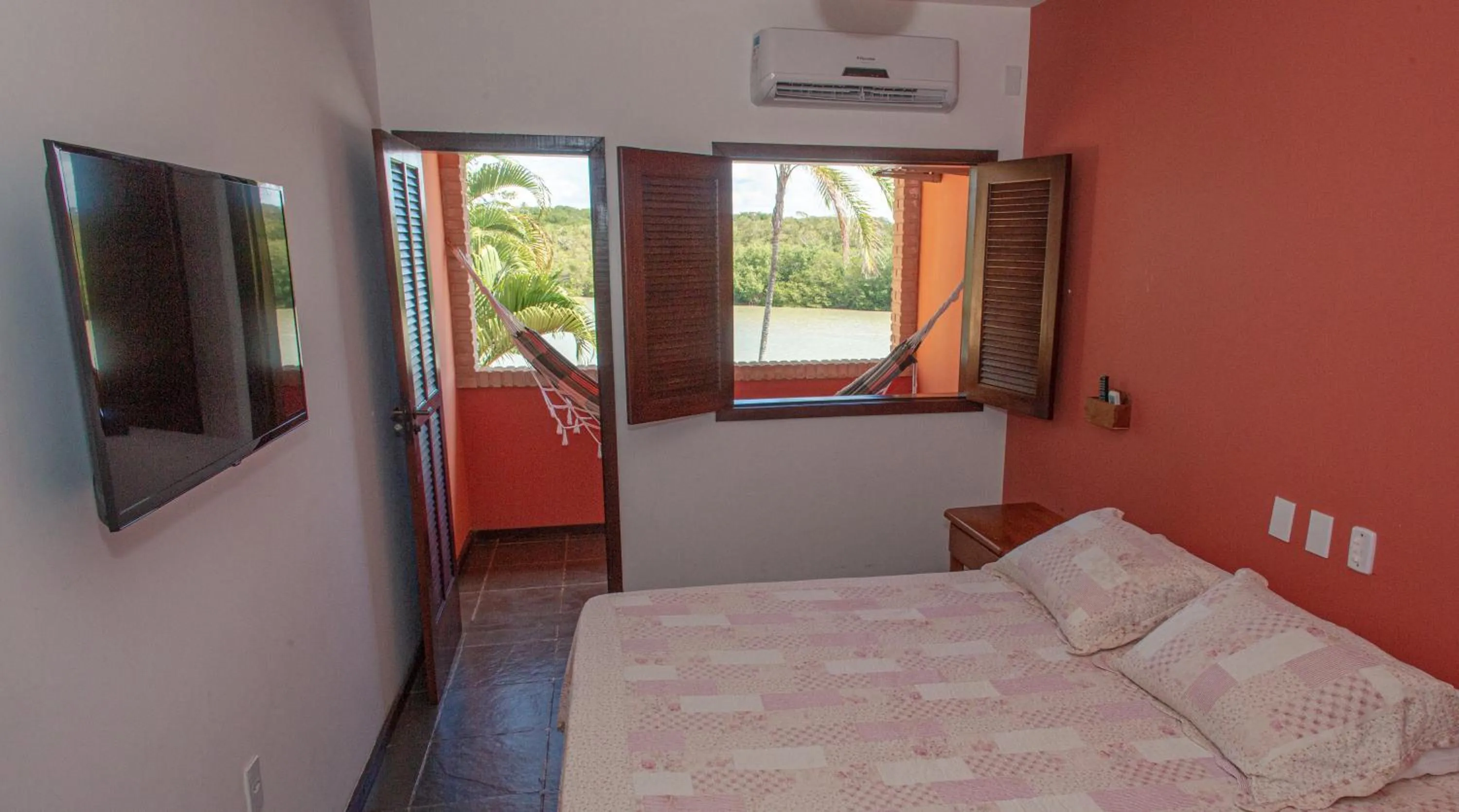 Bed in Pousada Canto do Rio