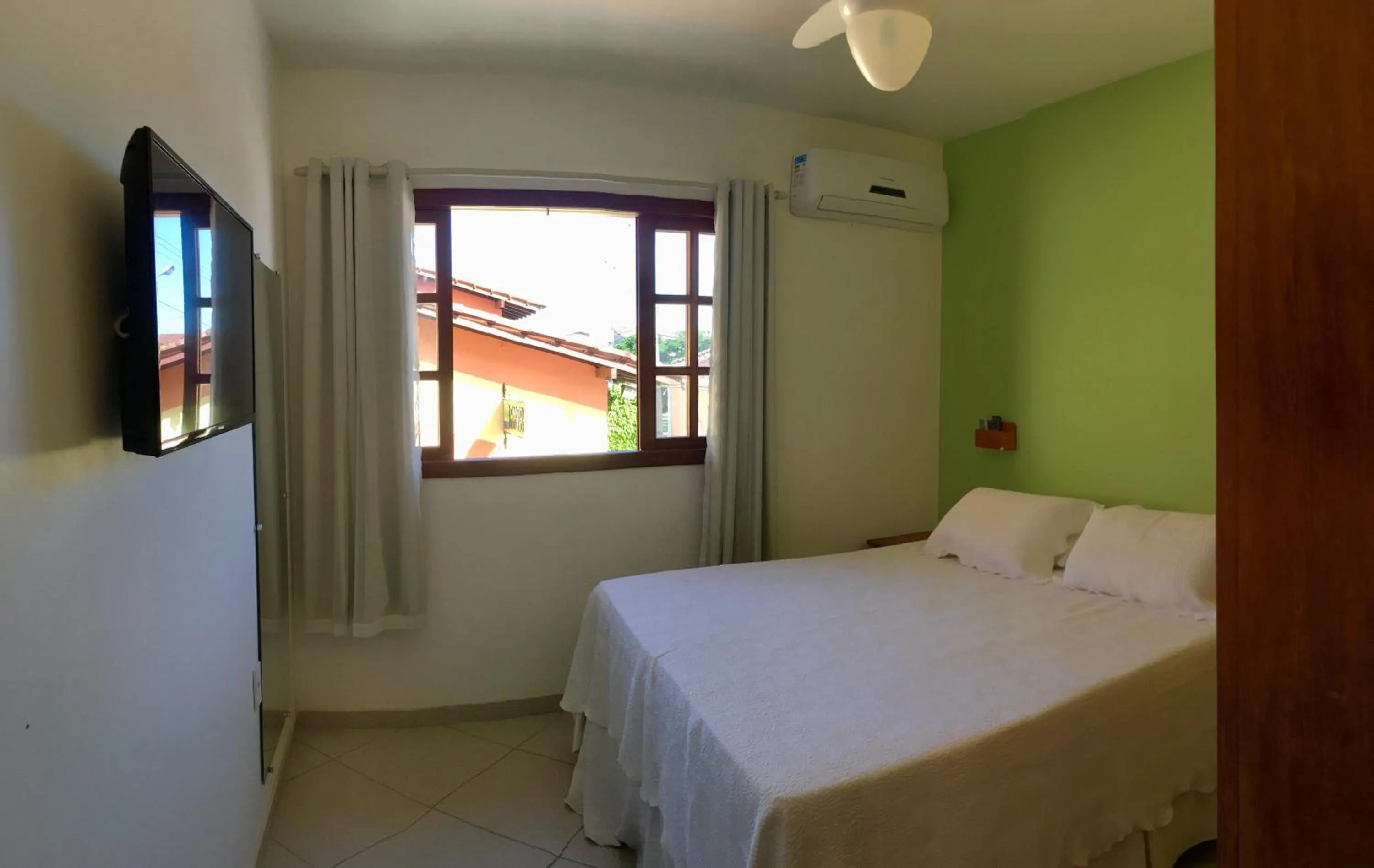 Bed in Pousada Canto do Rio