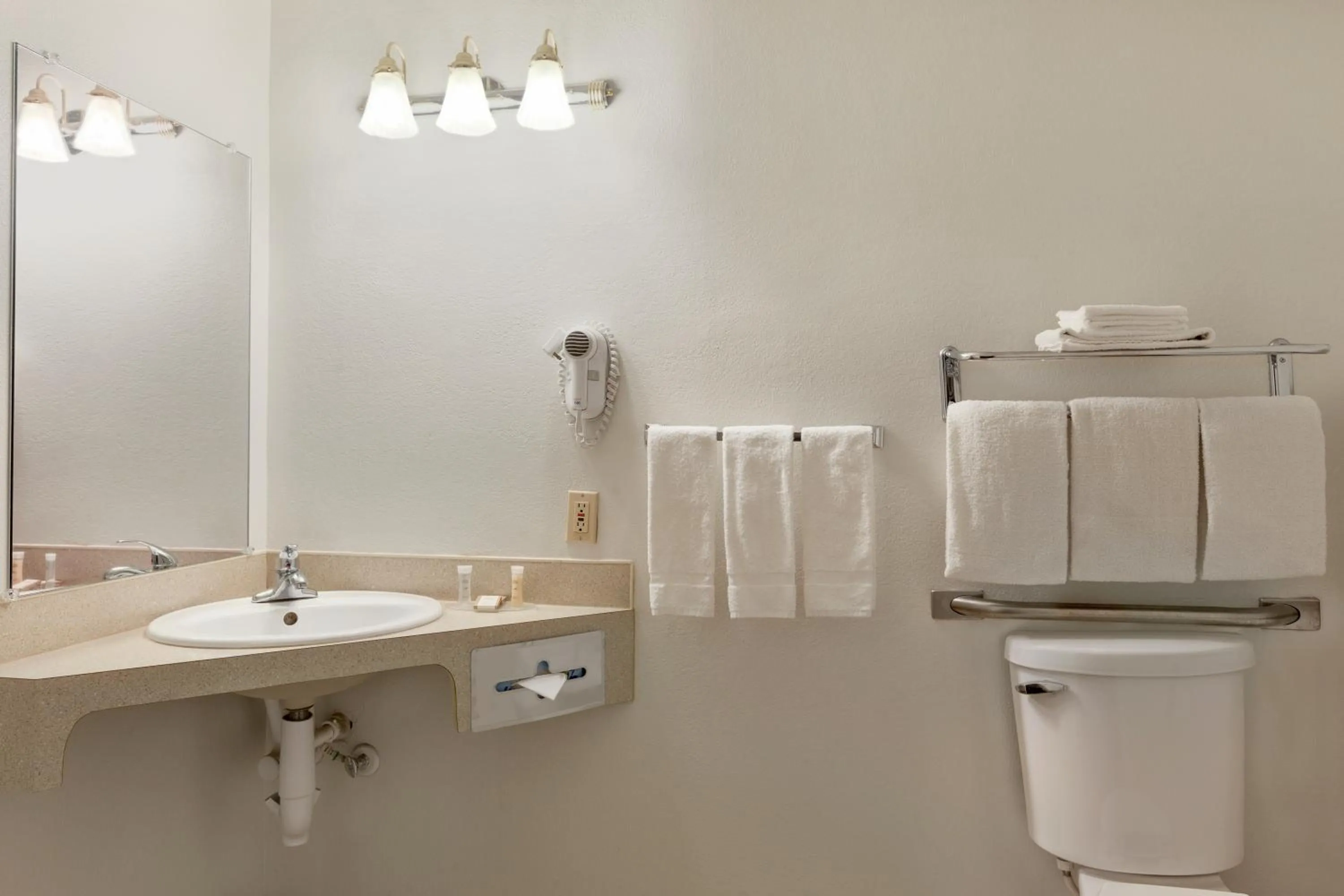 Toilet in Howard Johnson by Wyndham Salem