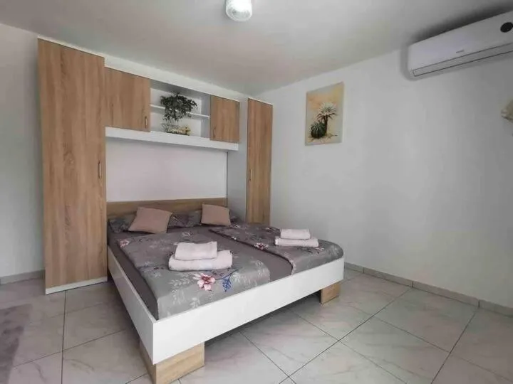Bed in Apartmani Jordanka