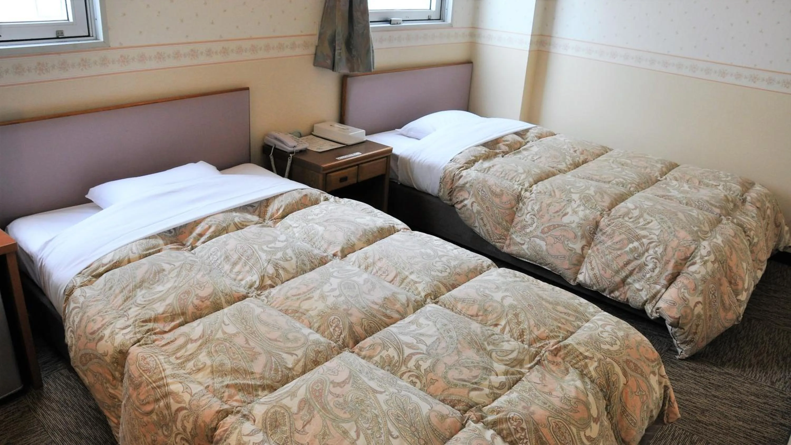 Bed in Matsue Plaza Hotel