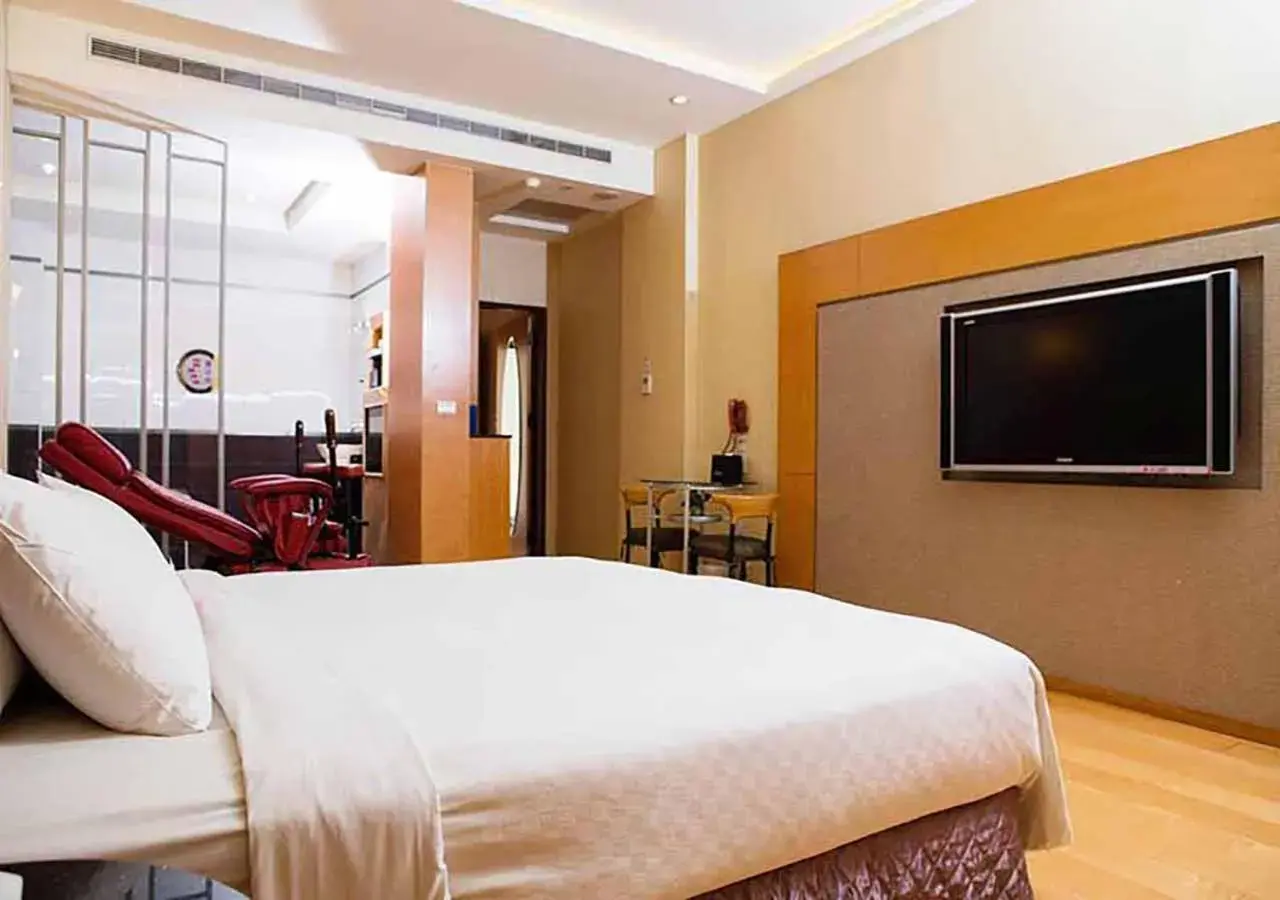 Bed in Royal Group Motel Chien Kuo Branch Bed in Royal Group Motel Chien Kuo Branch