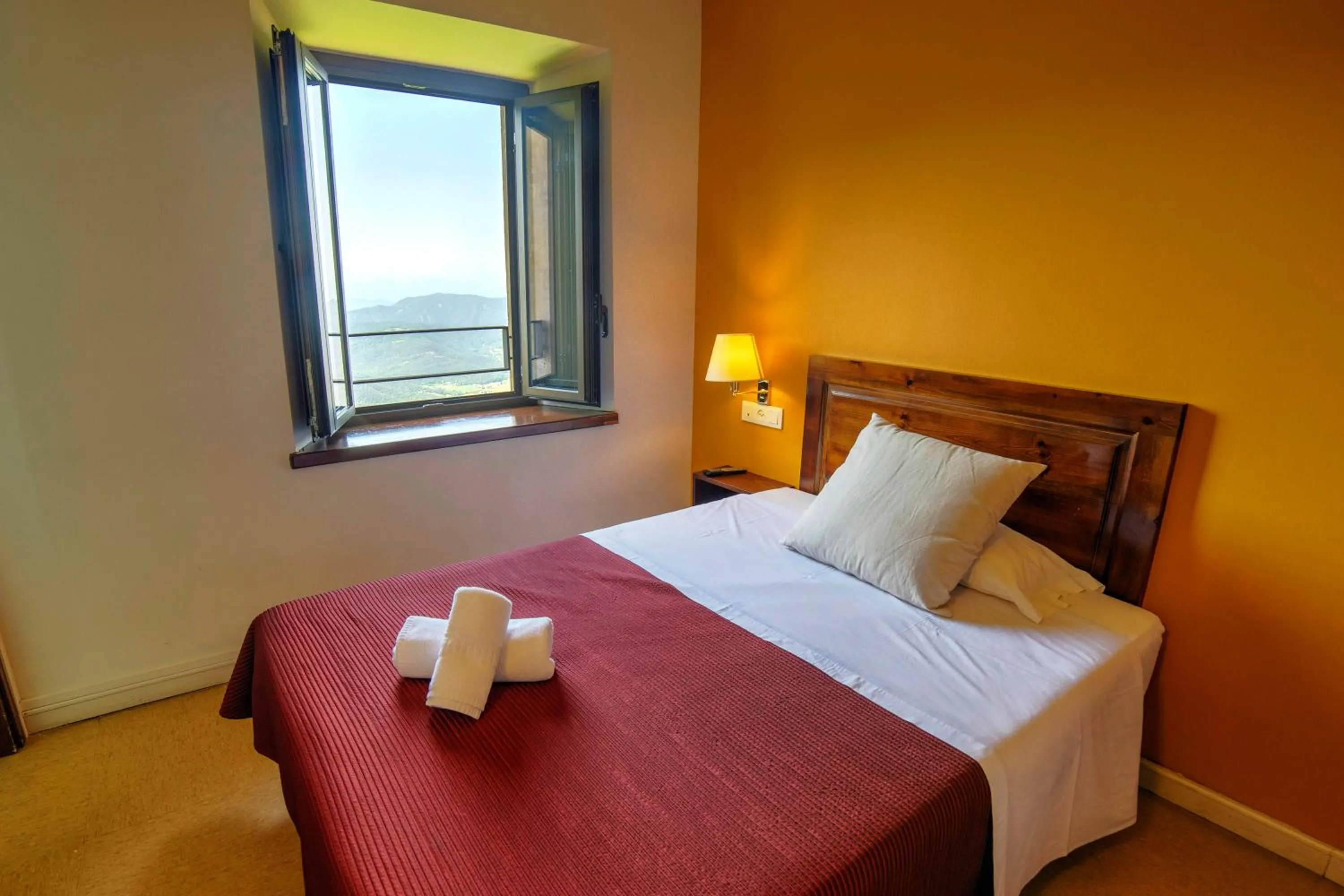 Photo of the whole room, Bed in Santuari de la Salut de Sant Feliu de Pallerols