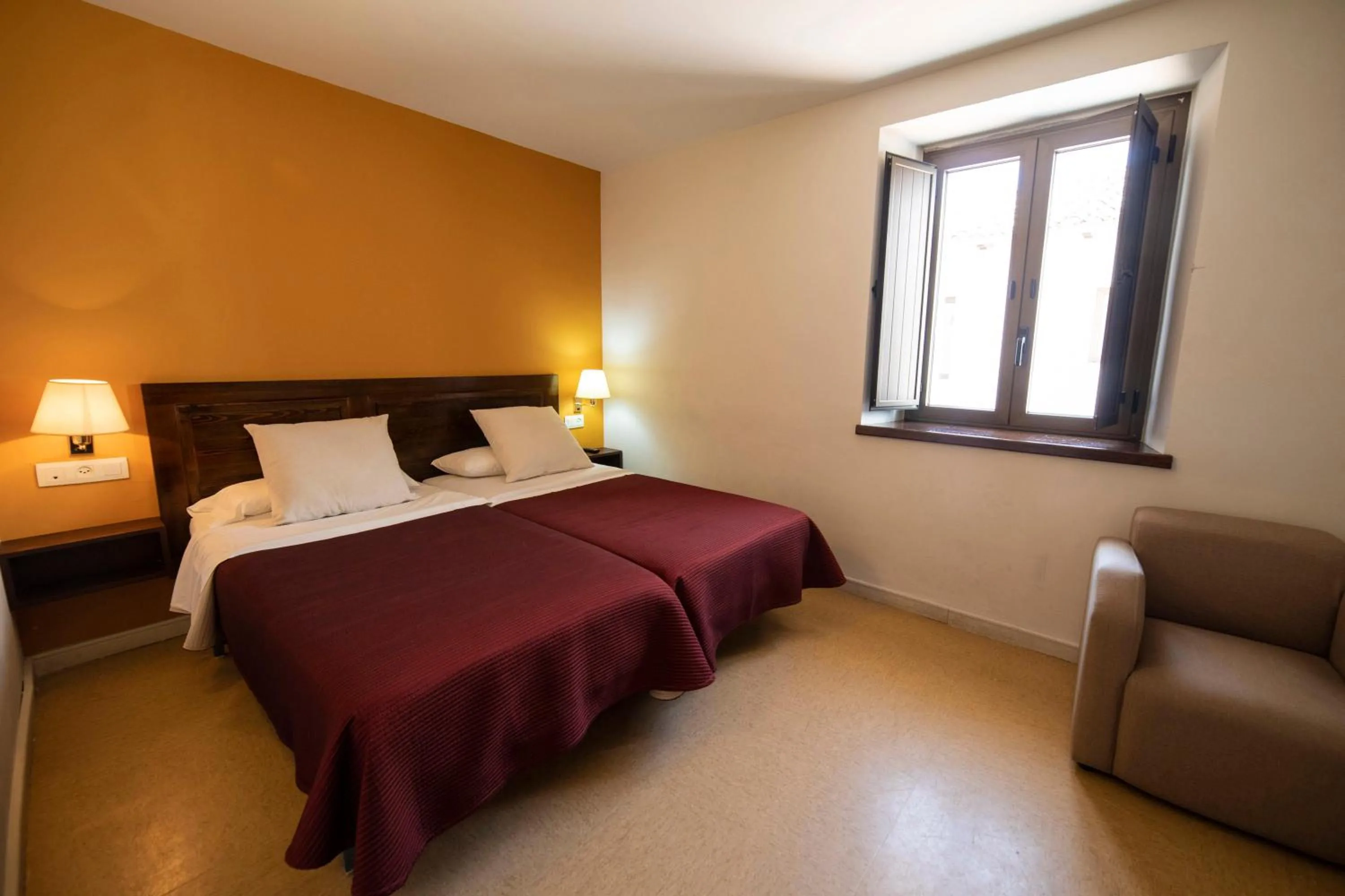 Photo of the whole room, Bed in Santuari de la Salut de Sant Feliu de Pallerols