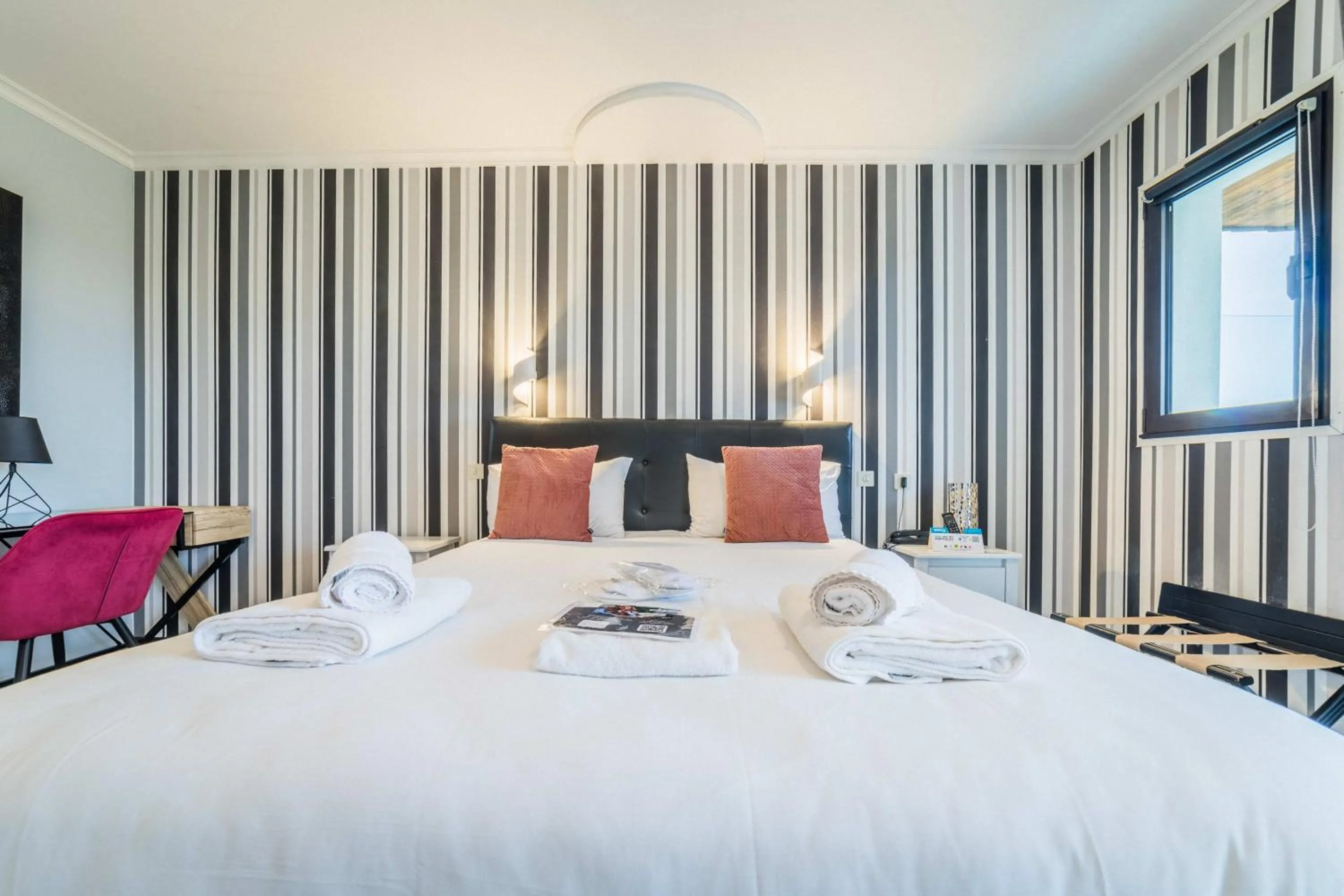 Bed in Logis Hôtel le Relais du Bas Limousin