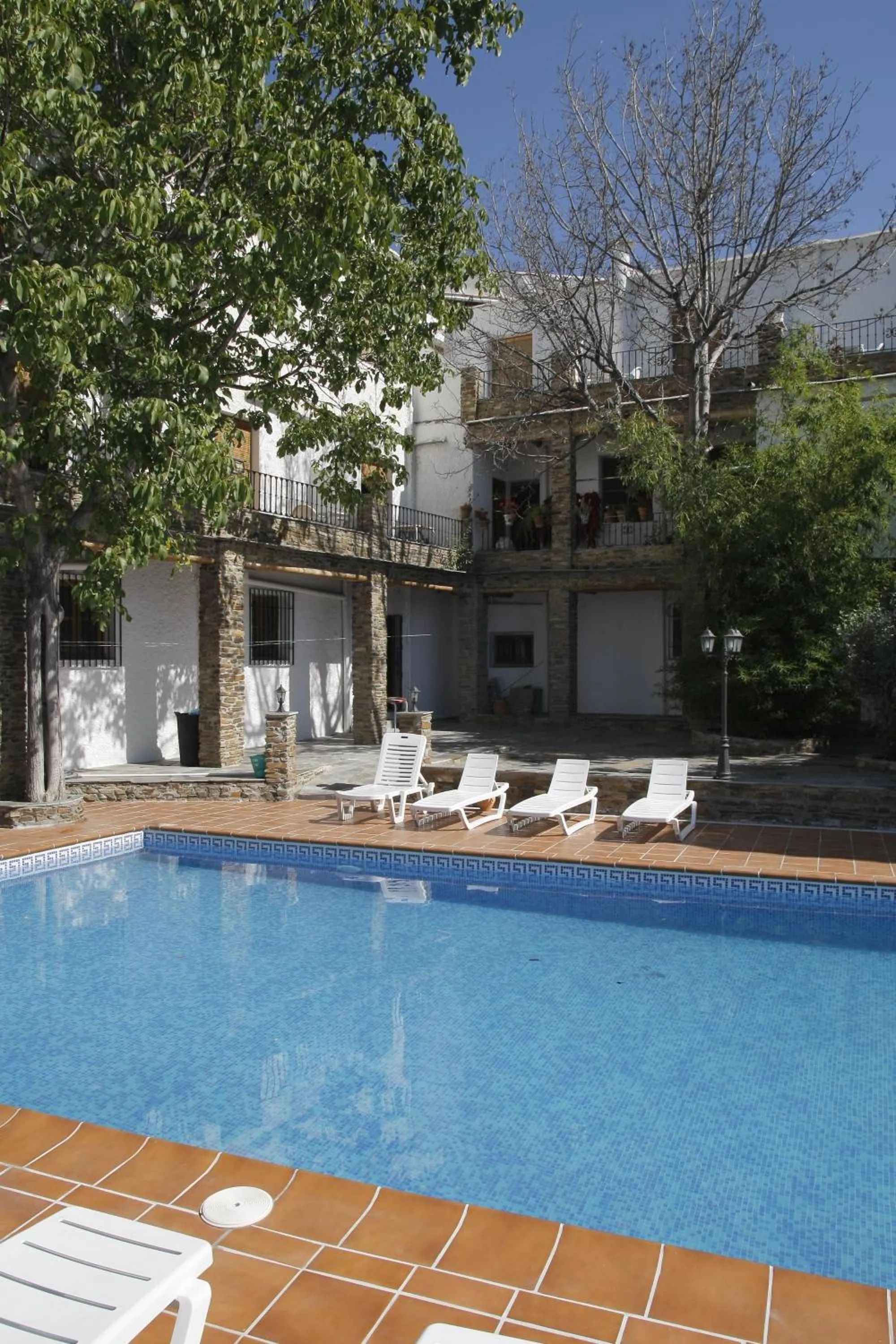 Swimming pool in Hotel Rural Real de Poqueira