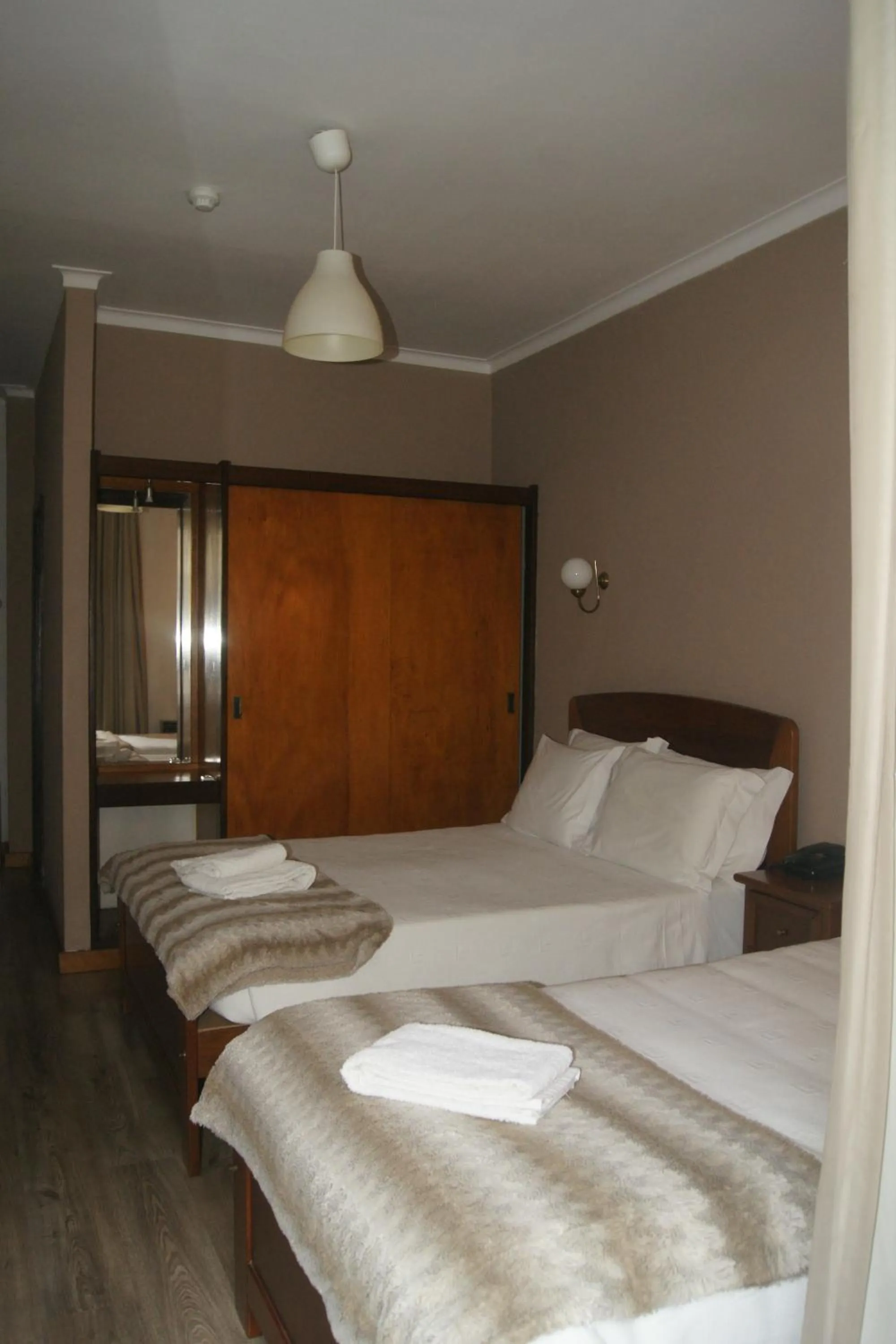 Bed in Hotel Chique Aliados