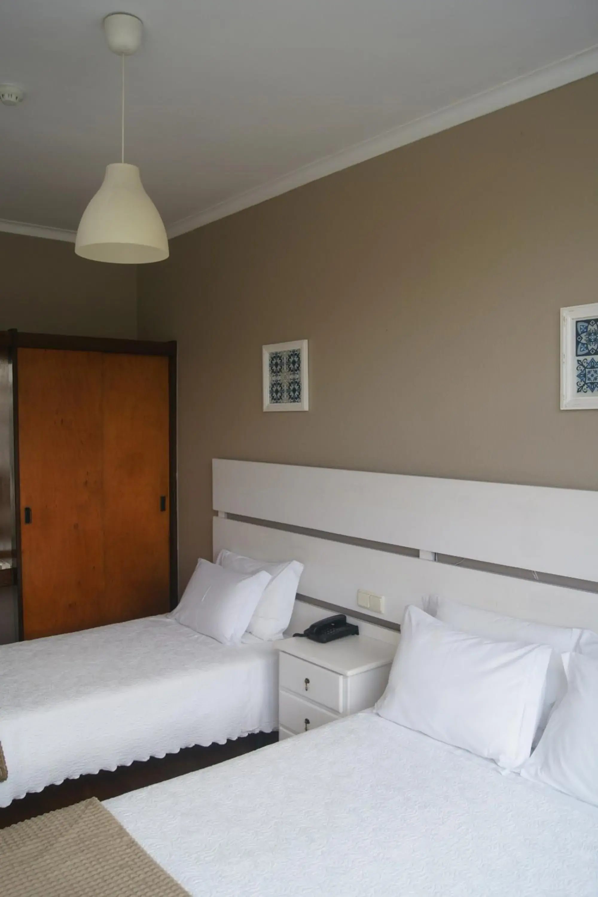 Triple Room in Hotel Chique Aliados Triple Room in Hotel Chique Aliados