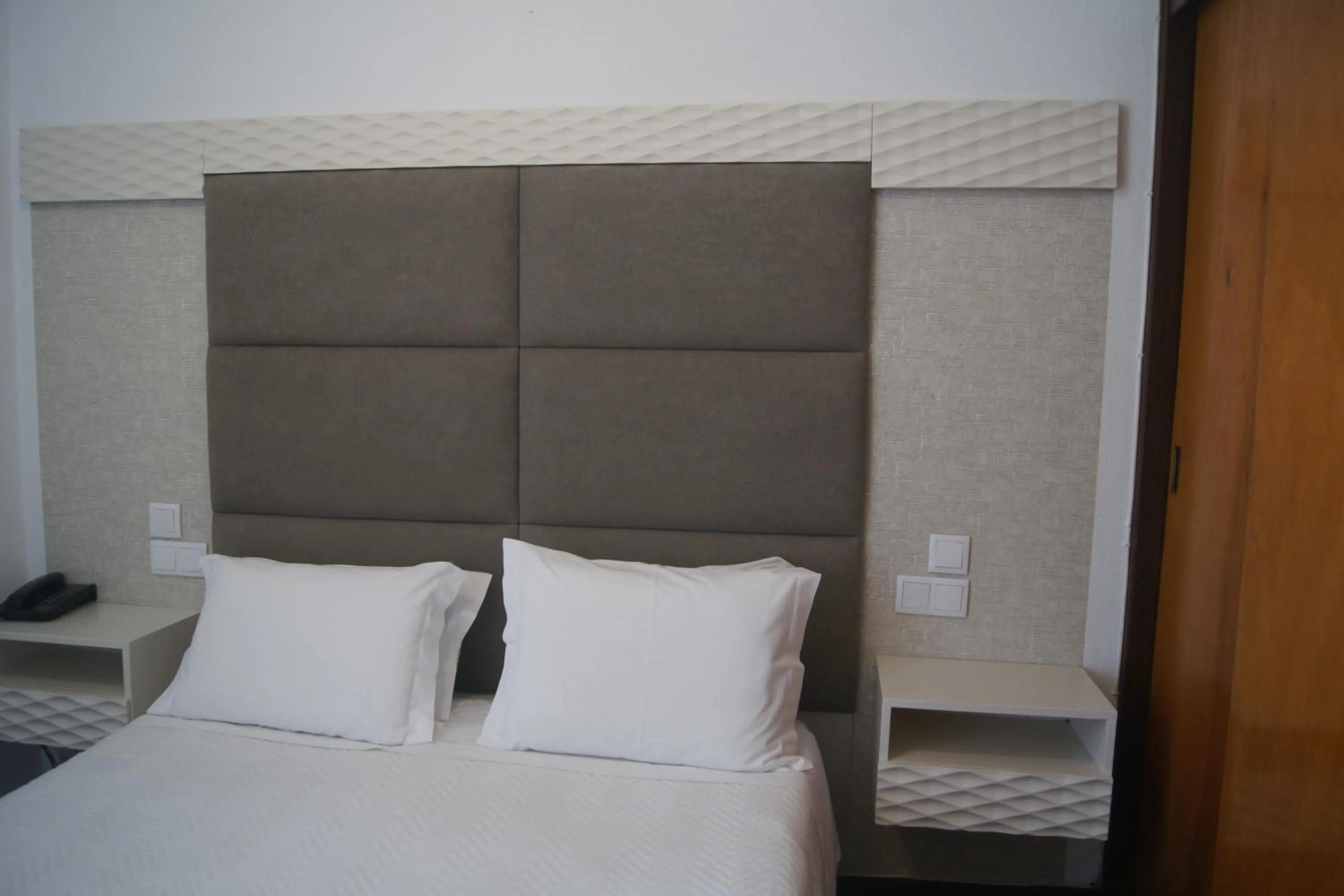 Bed in Hotel Chique Aliados