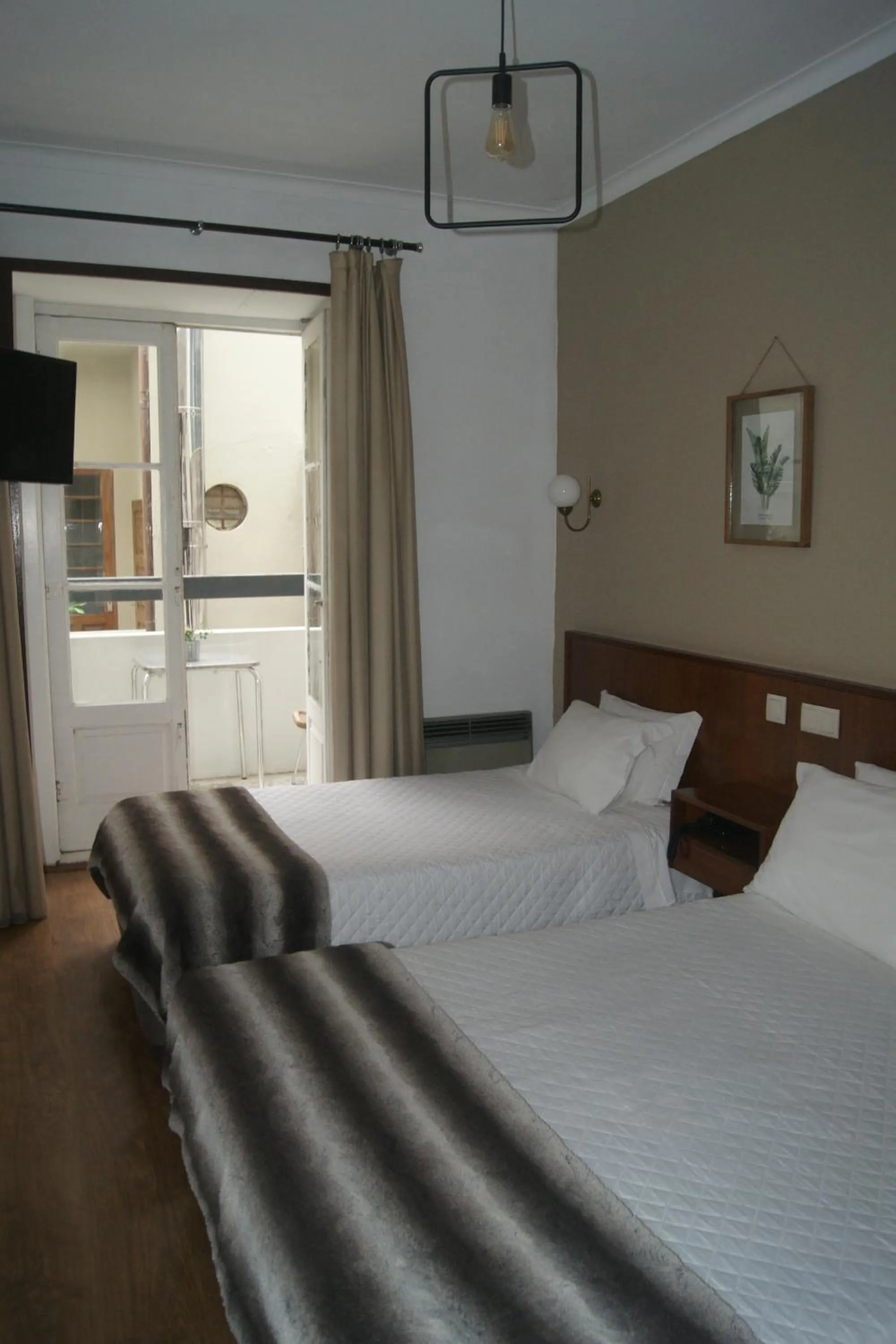 Bed in Hotel Chique Aliados