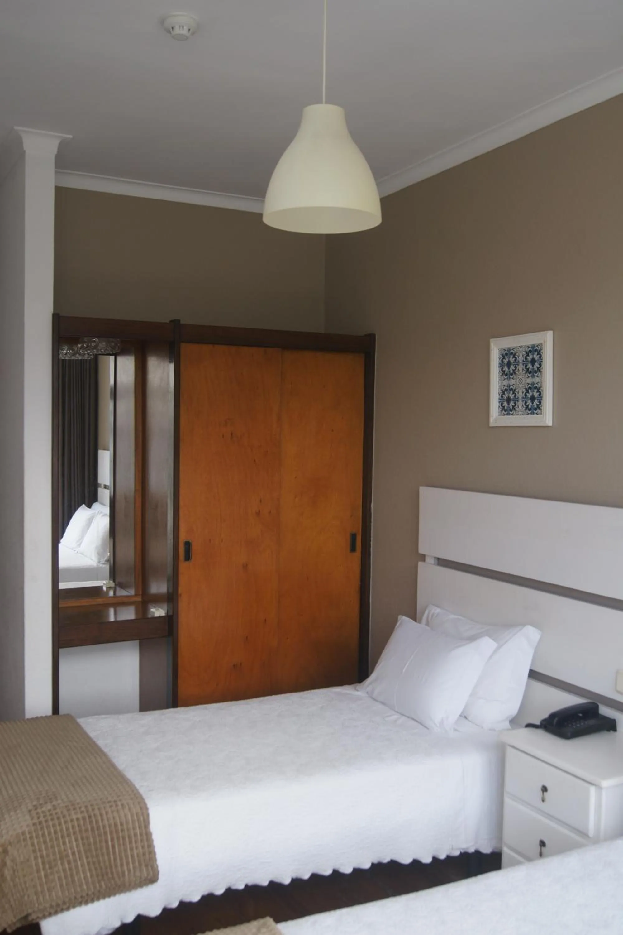 Bed in Hotel Chique Aliados