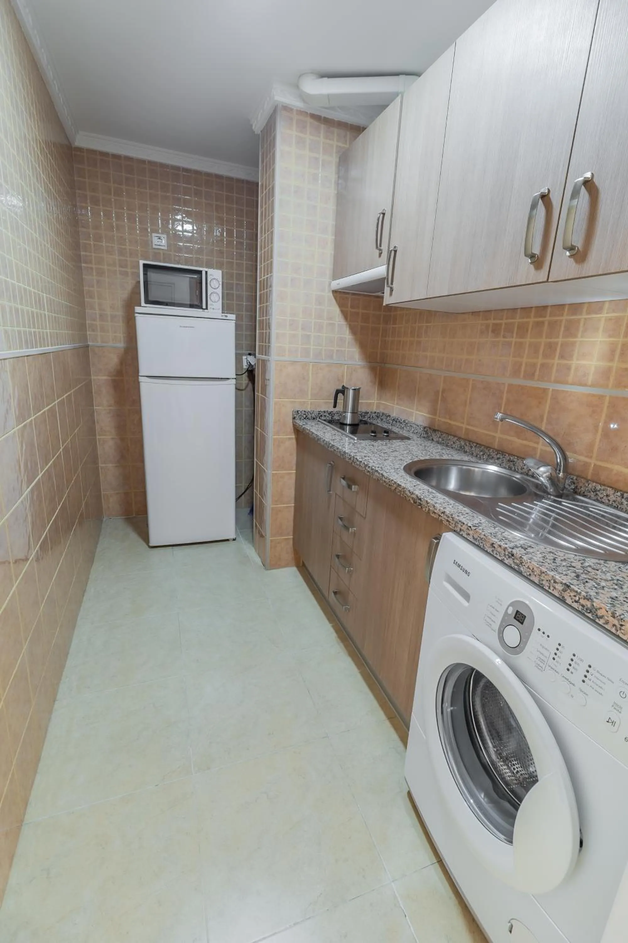 Kitchen or kitchenette in Apartamentos Turisticos Las Yucas