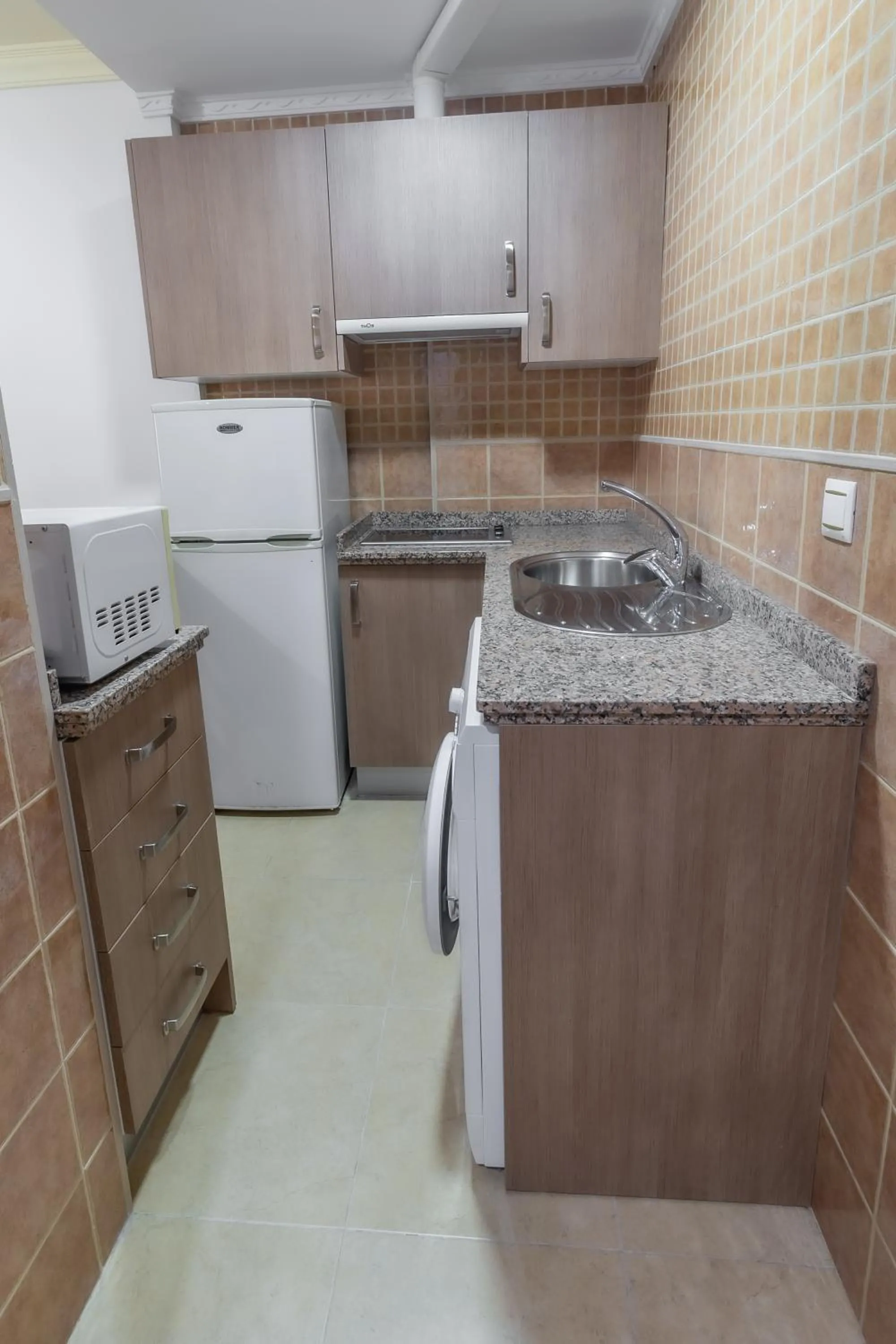 Kitchen or kitchenette in Apartamentos Turisticos Las Yucas