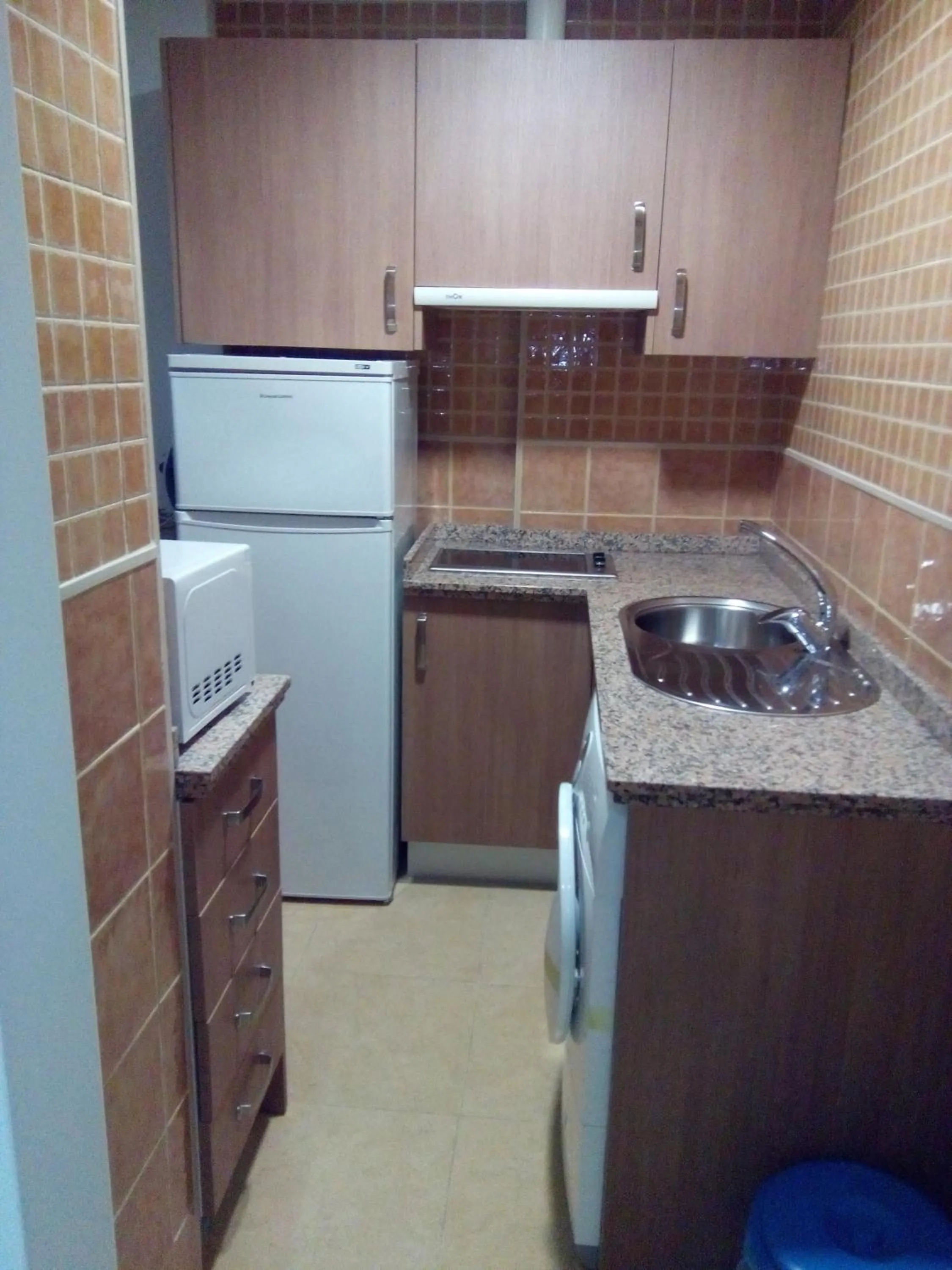 Kitchen or kitchenette in Apartamentos Turisticos Las Yucas