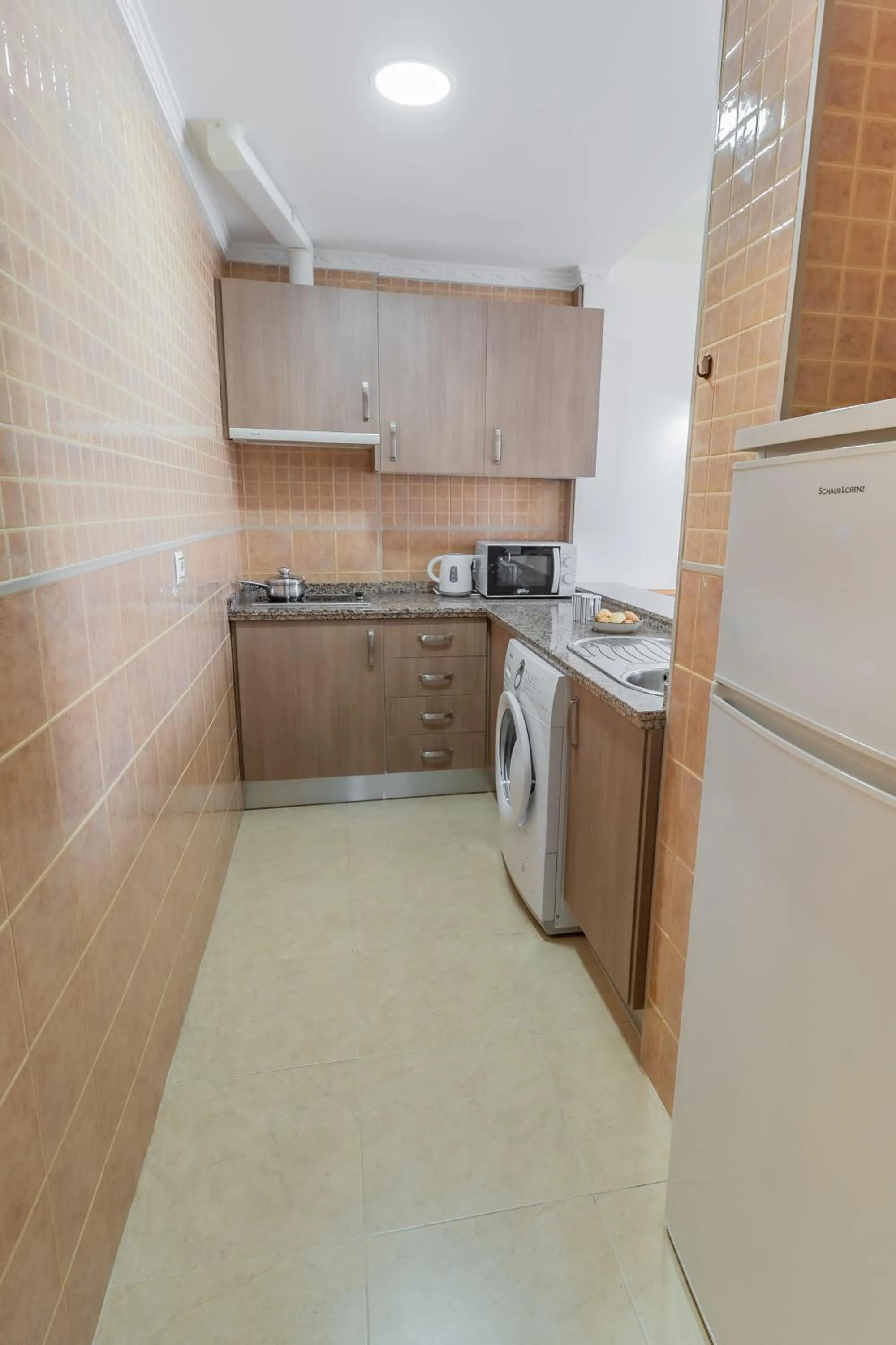 Kitchen or kitchenette in Apartamentos Turisticos Las Yucas