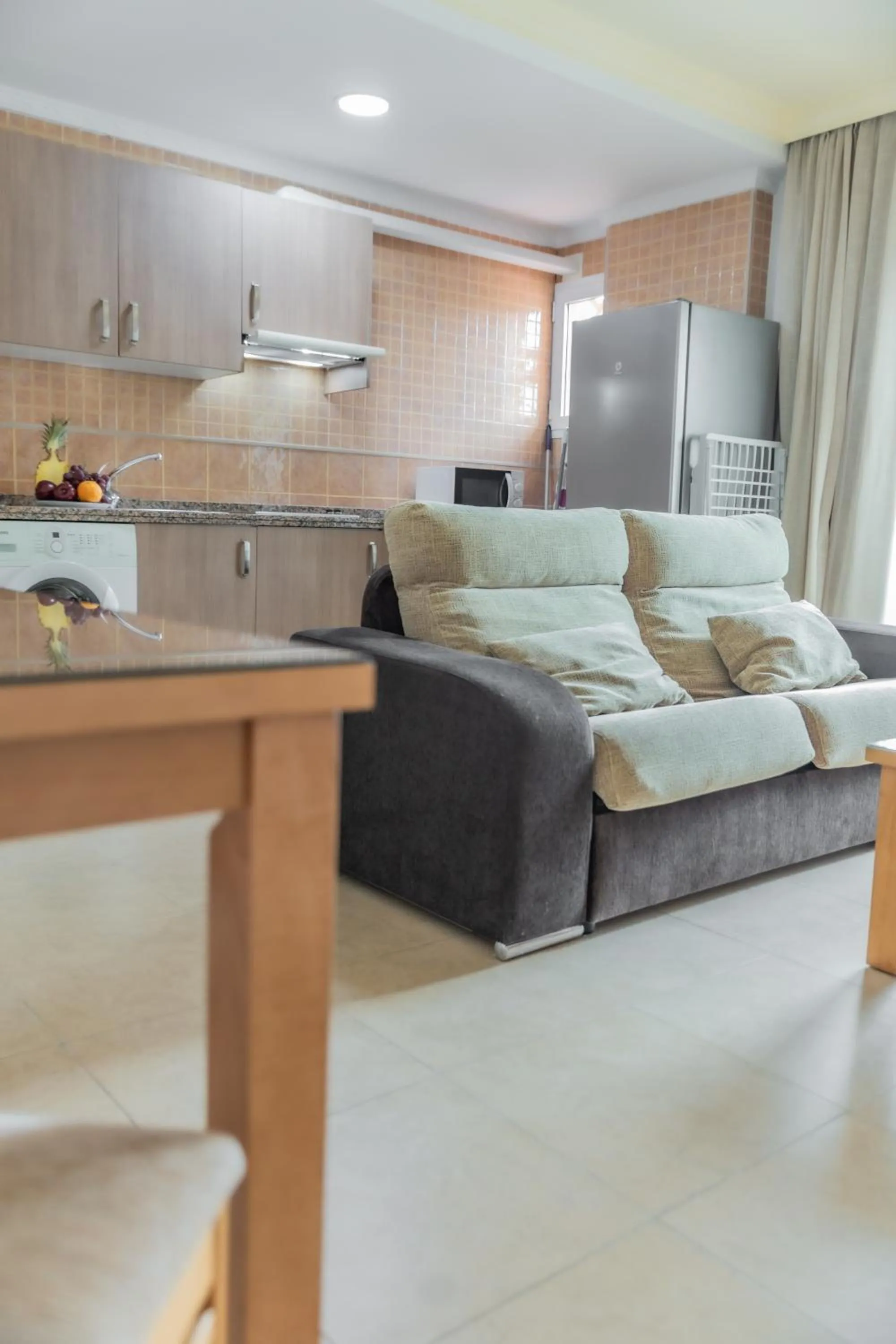Kitchen or kitchenette, Bed in Apartamentos Turisticos Las Yucas
