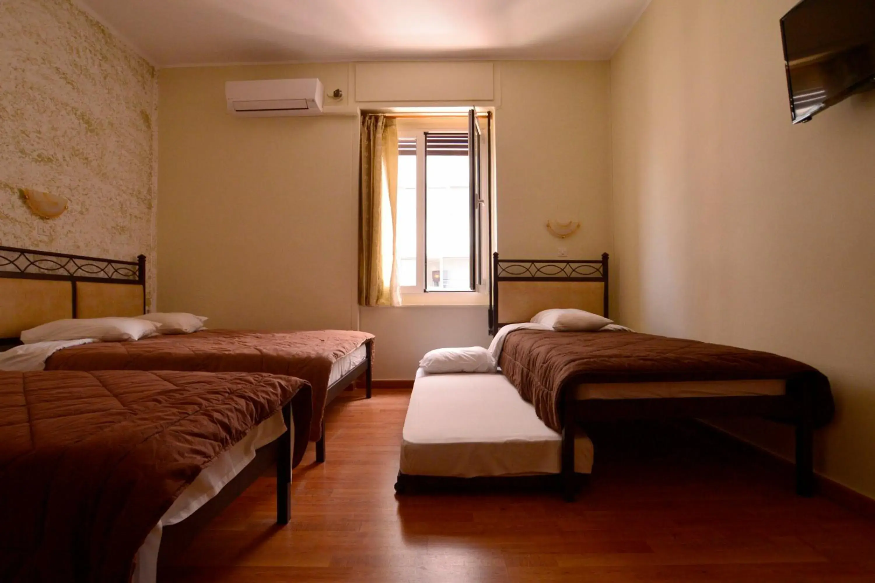 Triple Room in Electra Hotel Piraeus Triple Room in Electra Hotel Piraeus