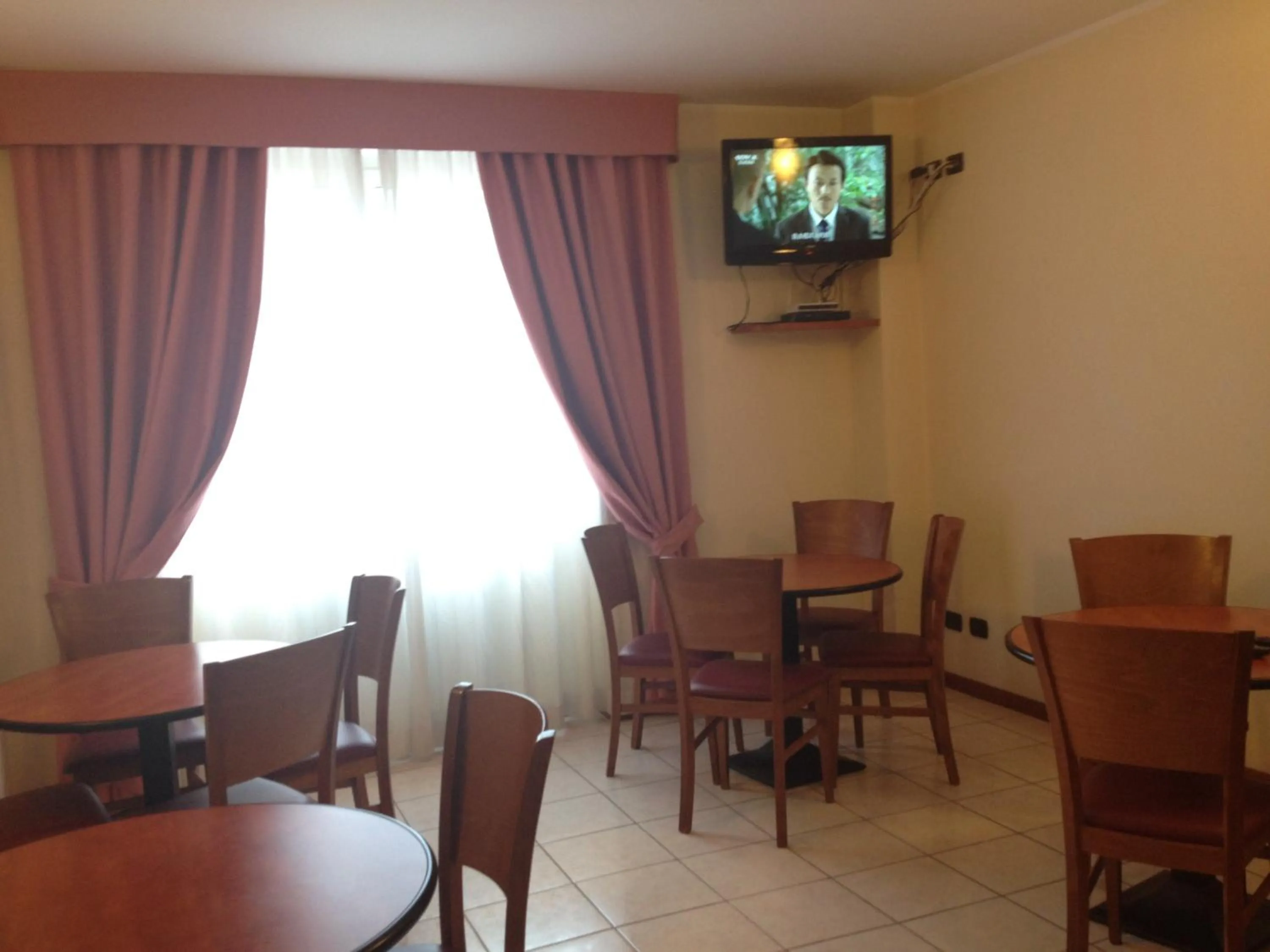 Communal lounge/ TV room in Hotel Belforte