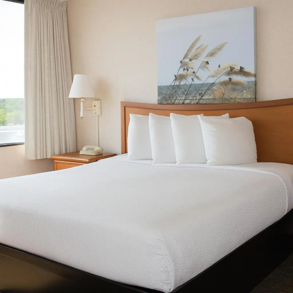 Bed in Four Sails Resort