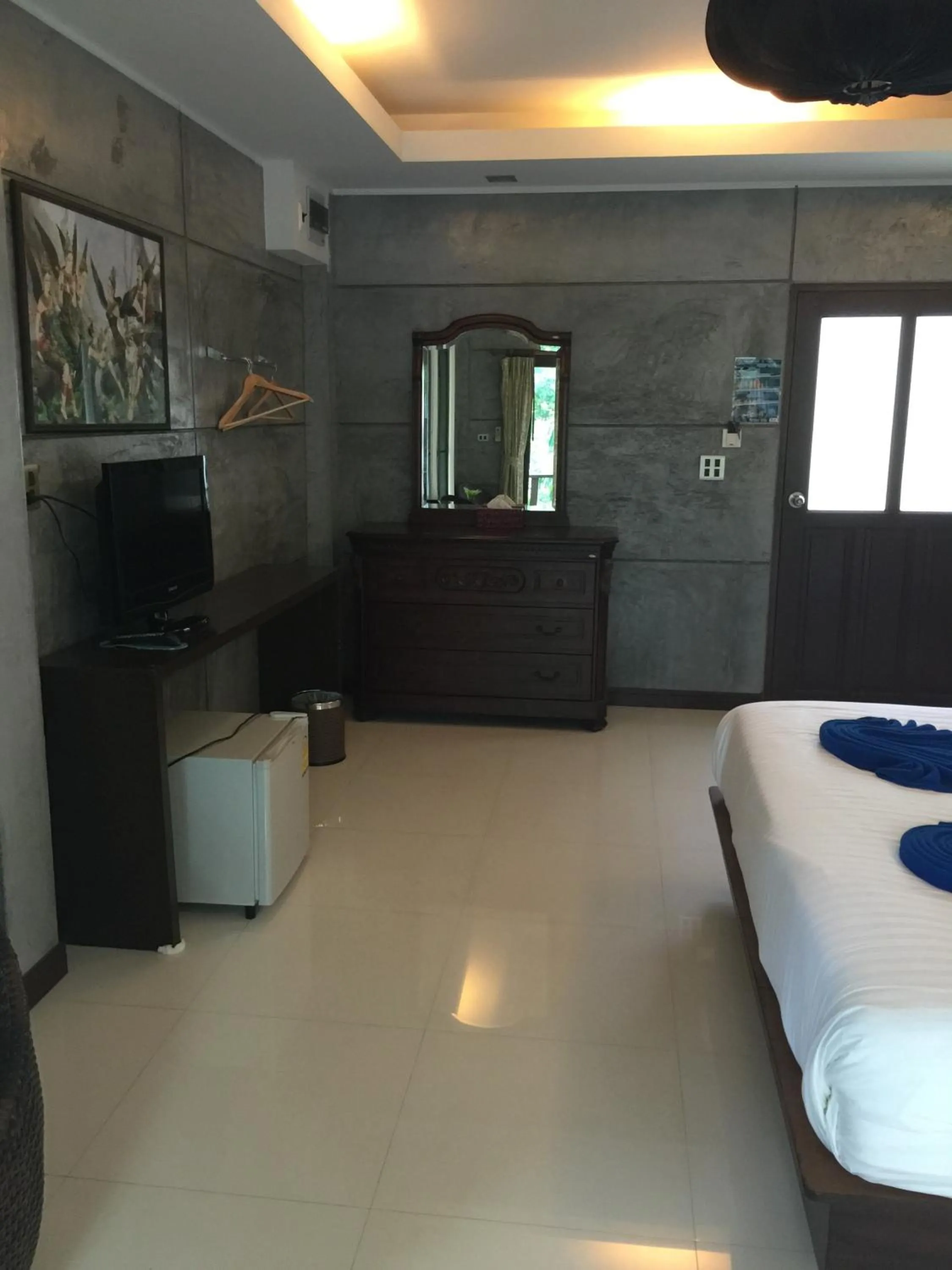 Photo of the whole room, Bed in In Touch Resort