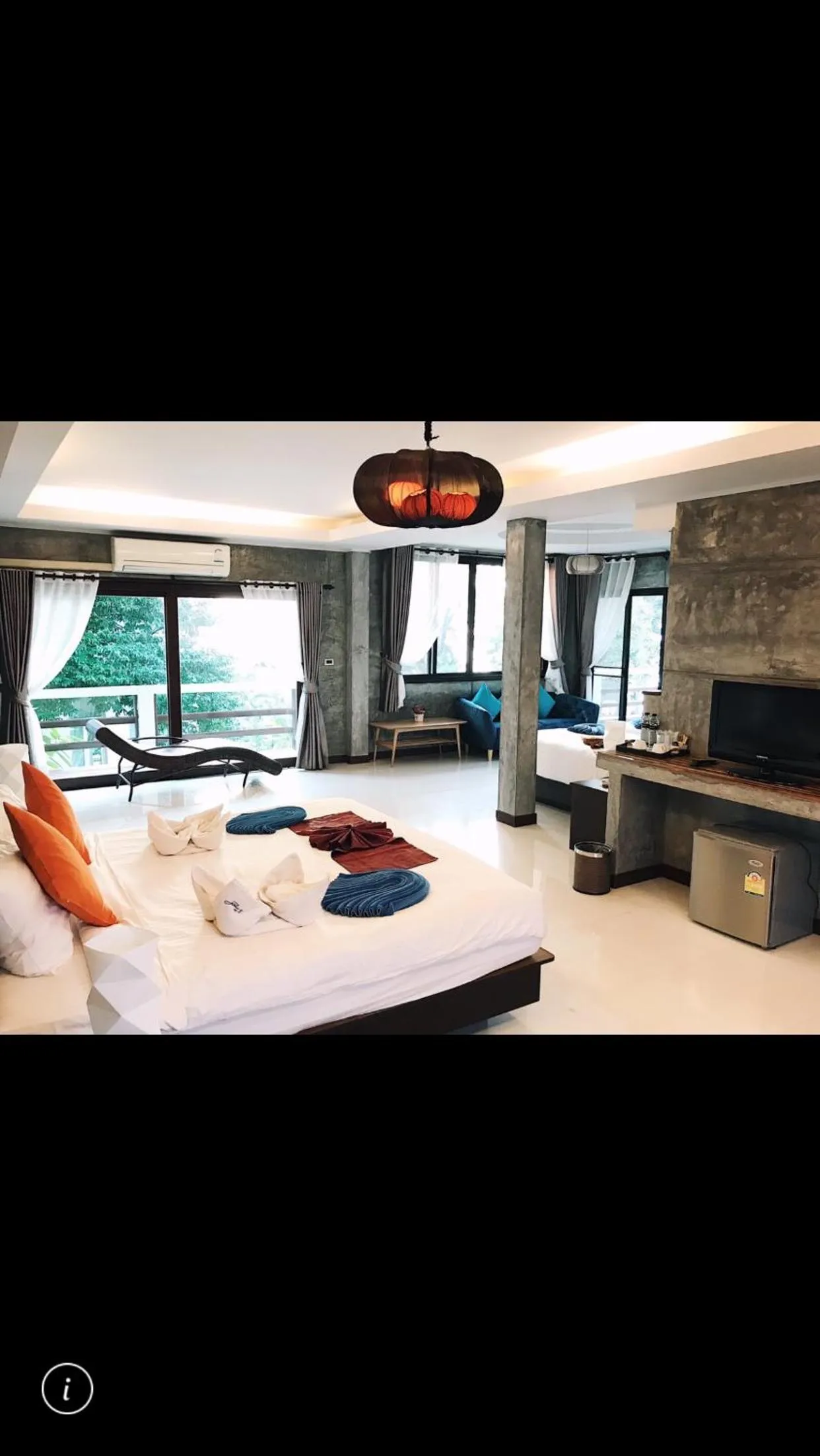 Photo of the whole room, Bed in In Touch Resort