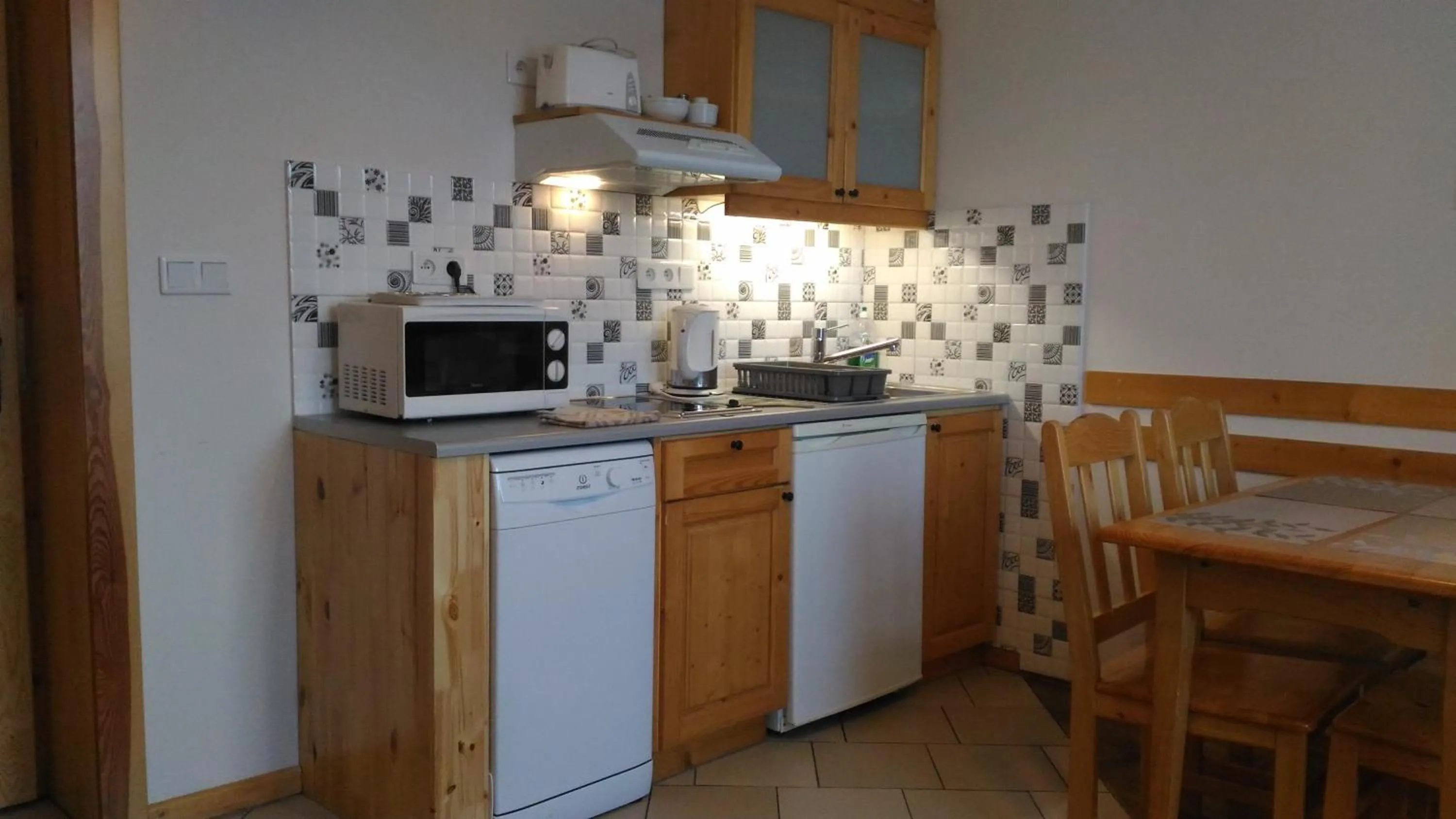 Kitchen or kitchenette in Apartamenty ApartArt Zakopane