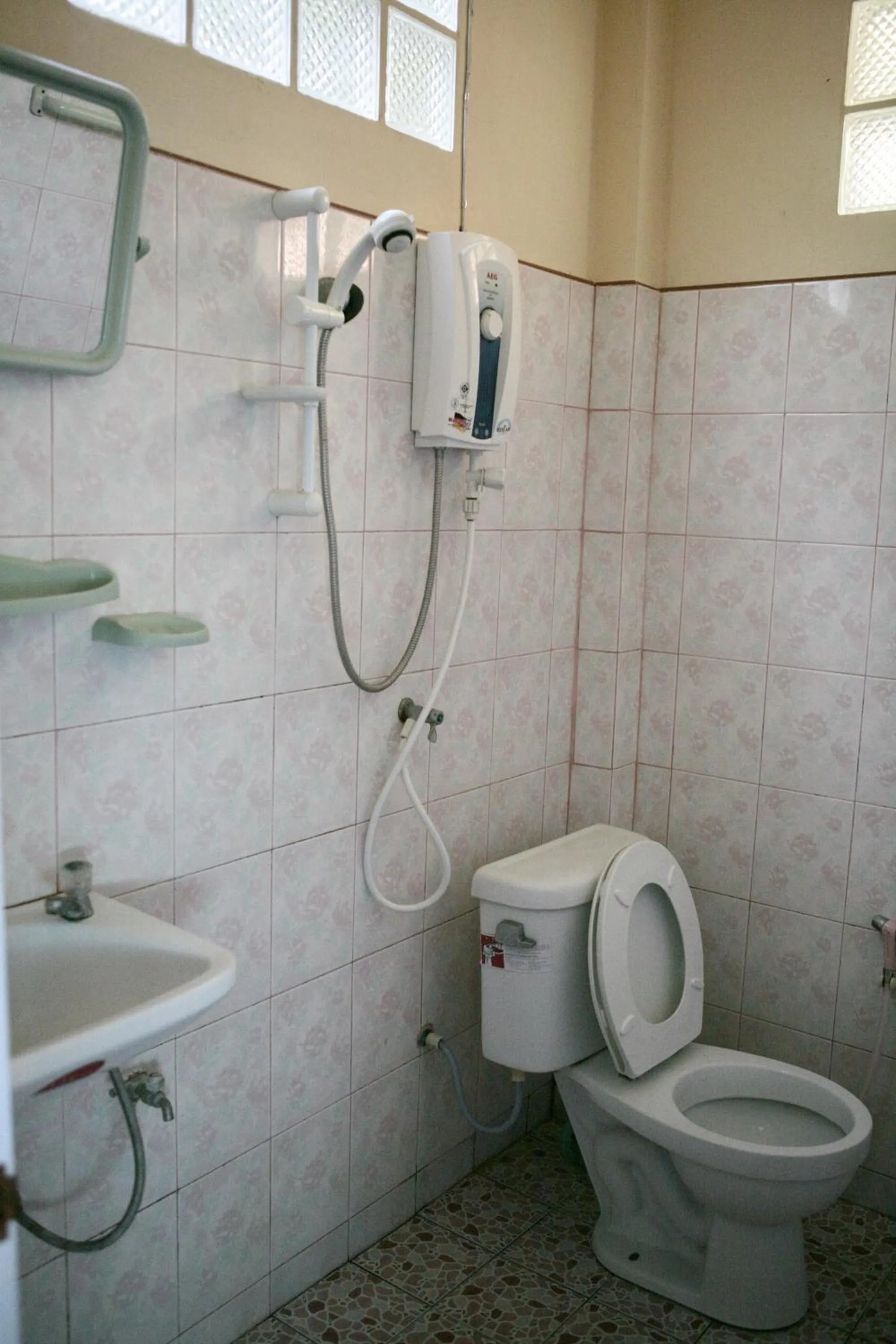 Shower in Jungle Hut Bungalows & Hotel