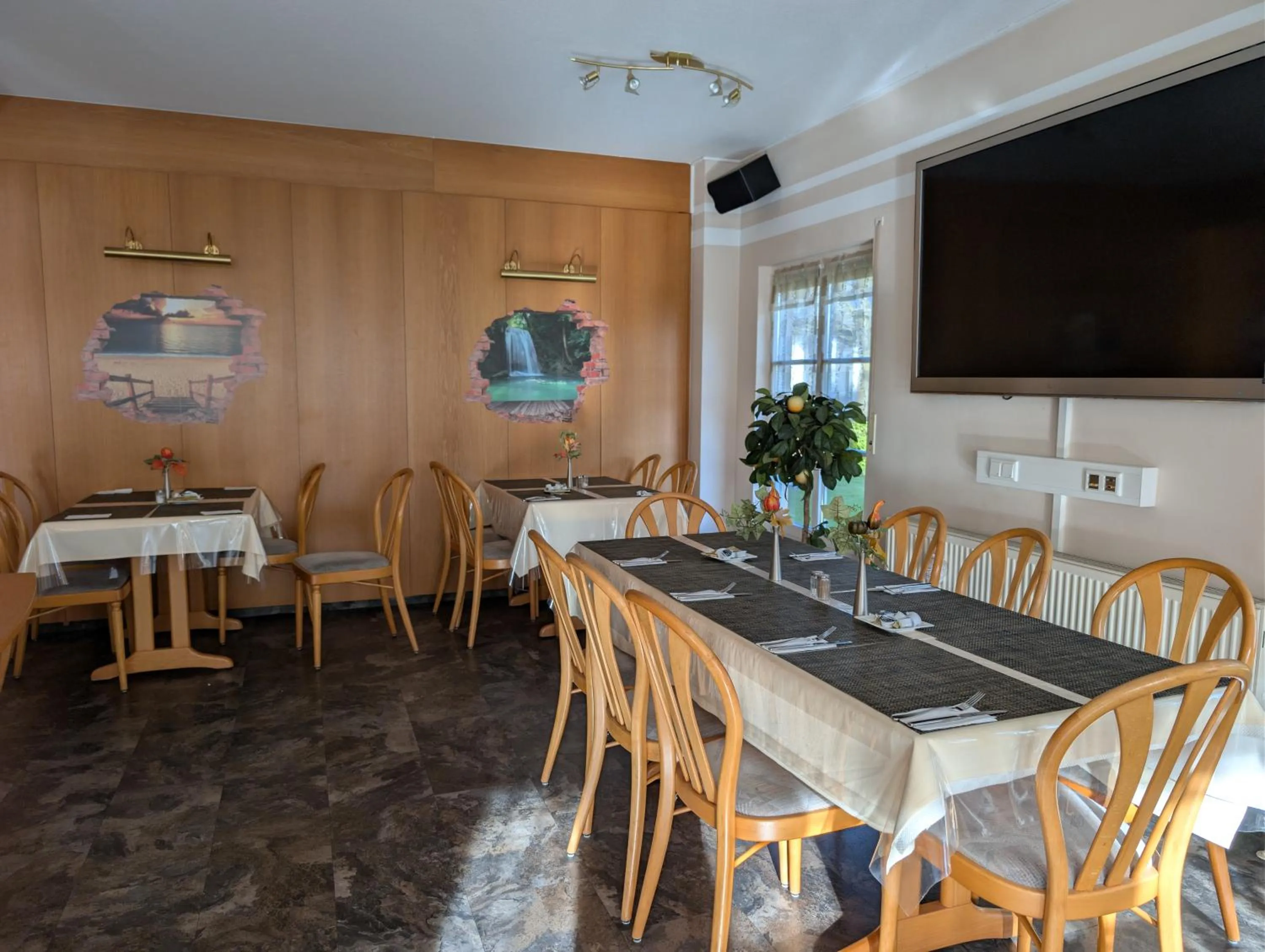 Dining area in Landhaus Hotel Müller