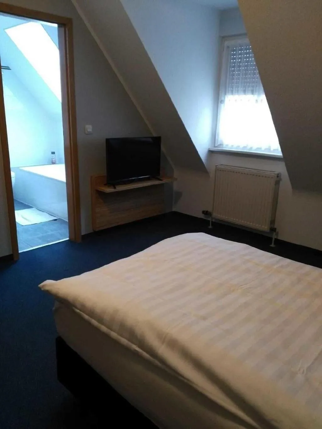 Bed in Landhaus Hotel Müller