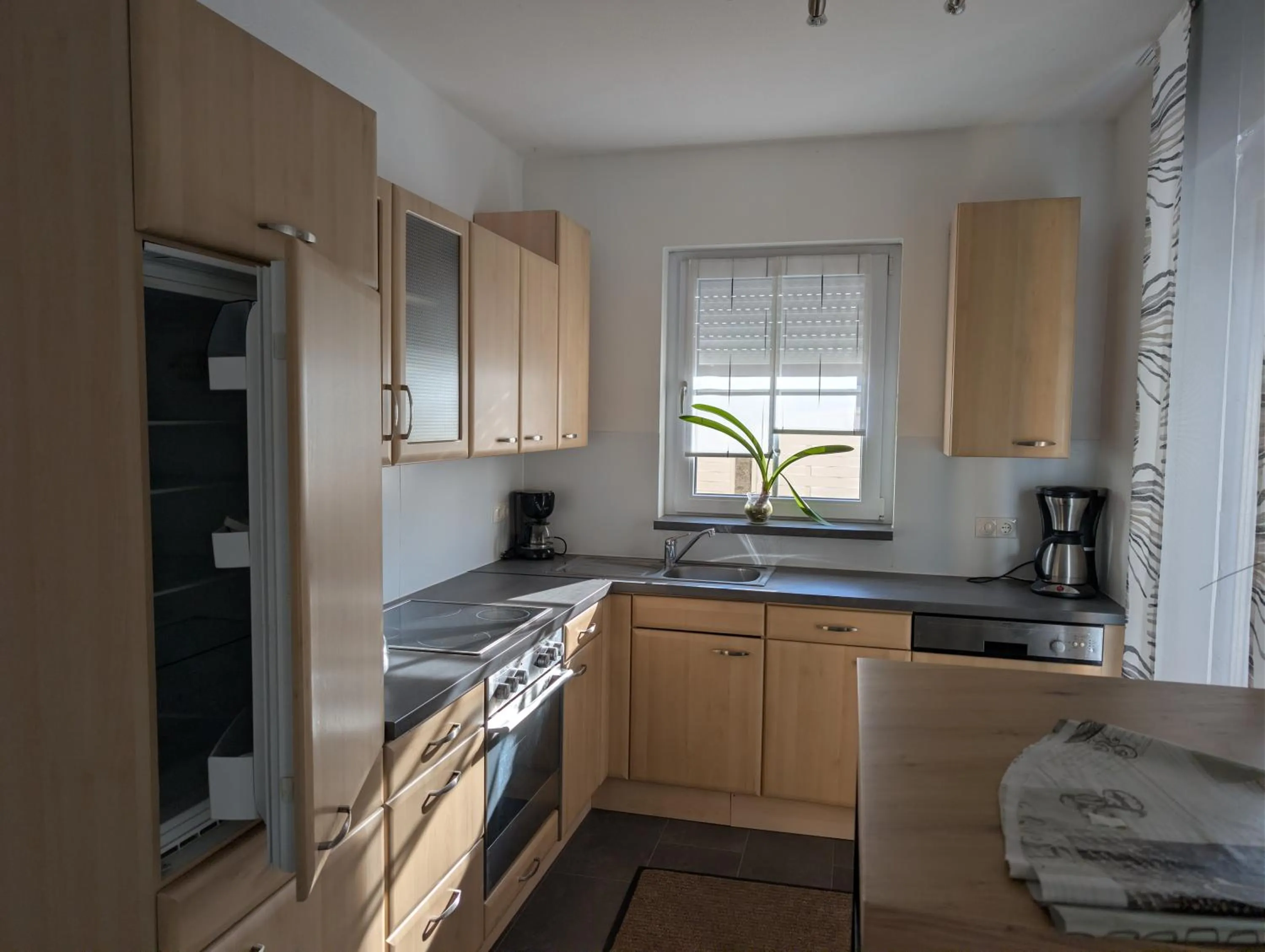 Kitchen or kitchenette in Landhaus Hotel Müller