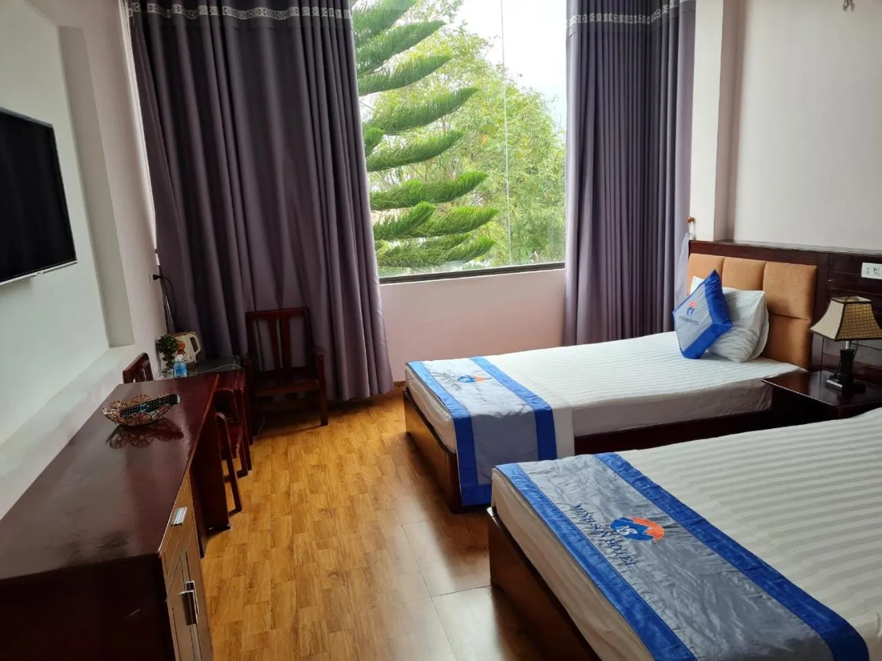 Bed in Minh Sơn HOTEL