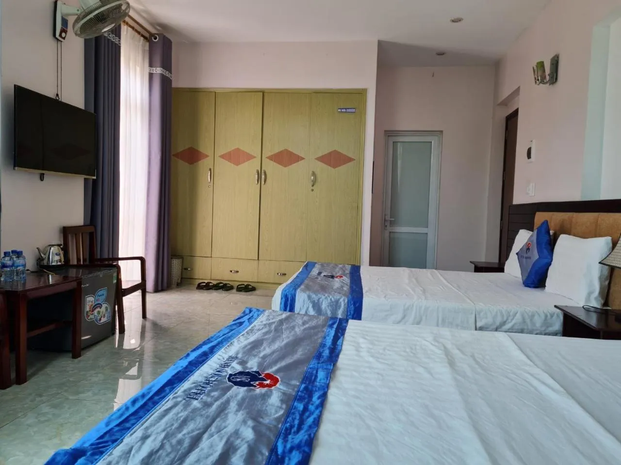 Bed in Minh Sơn HOTEL