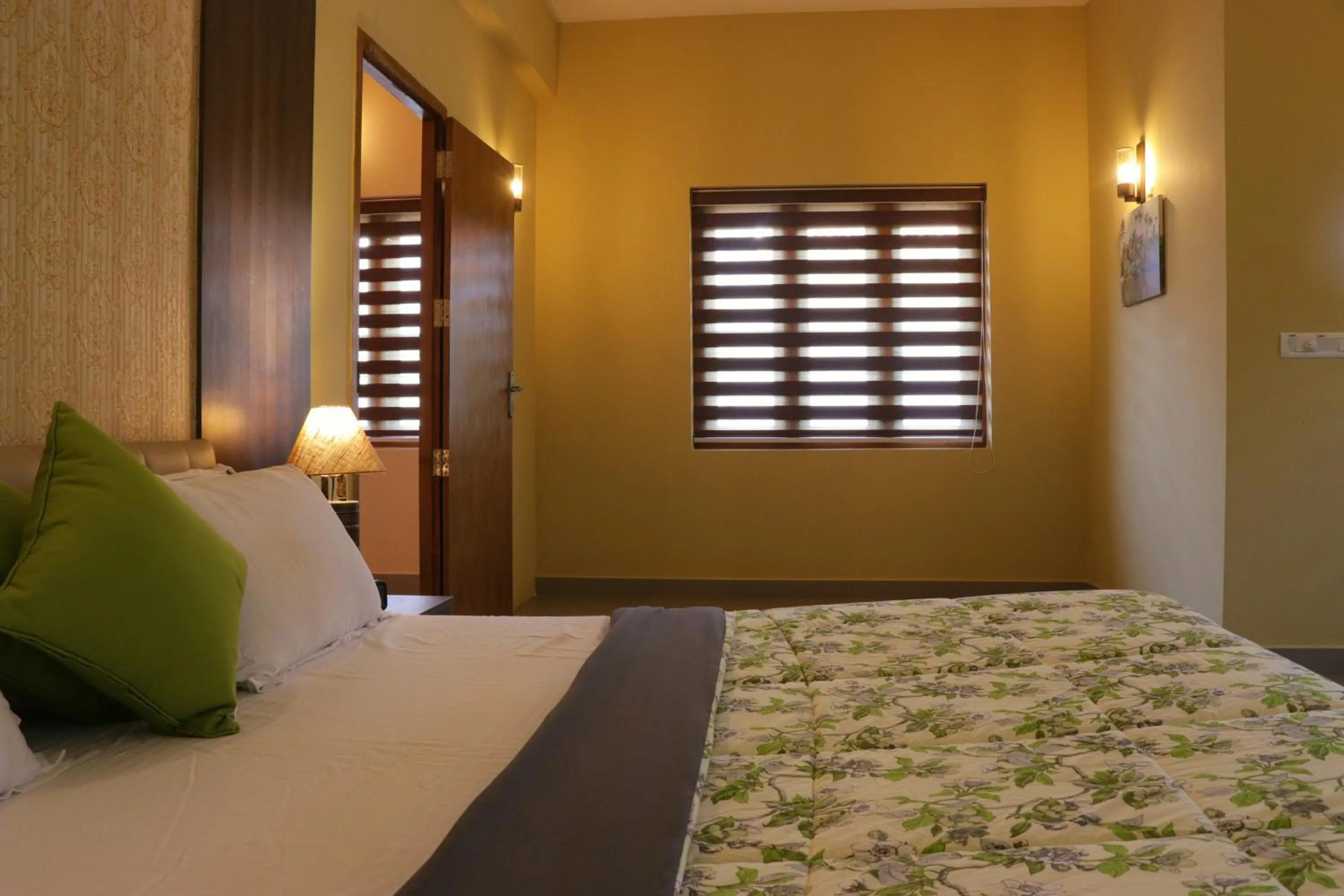 Deluxe Double Room with Balcony - single occupancy in Water's Edge Villas