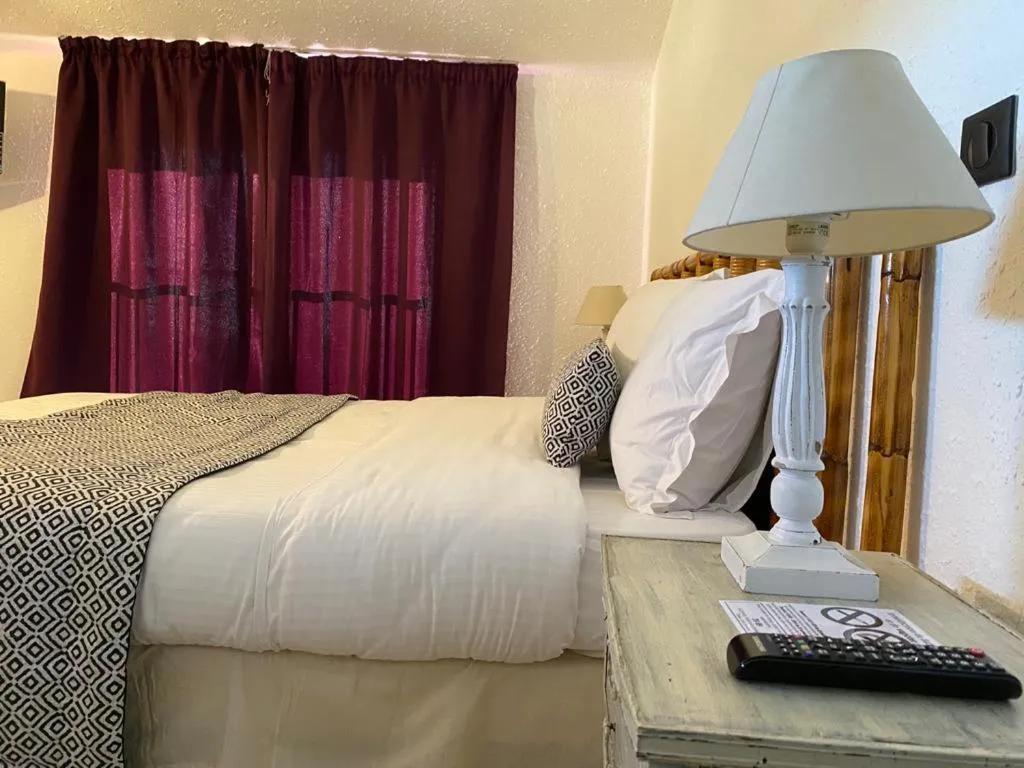 Bed in Avocado Hôtel Restaurant