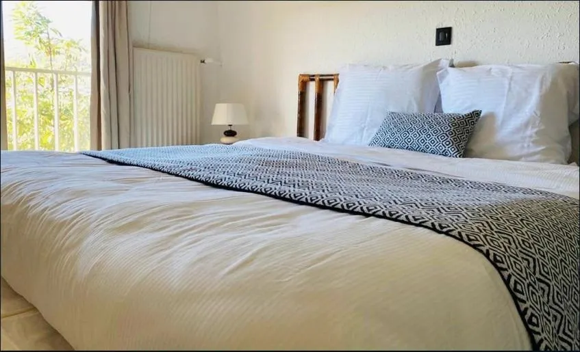 Bed in Avocado Hôtel Restaurant