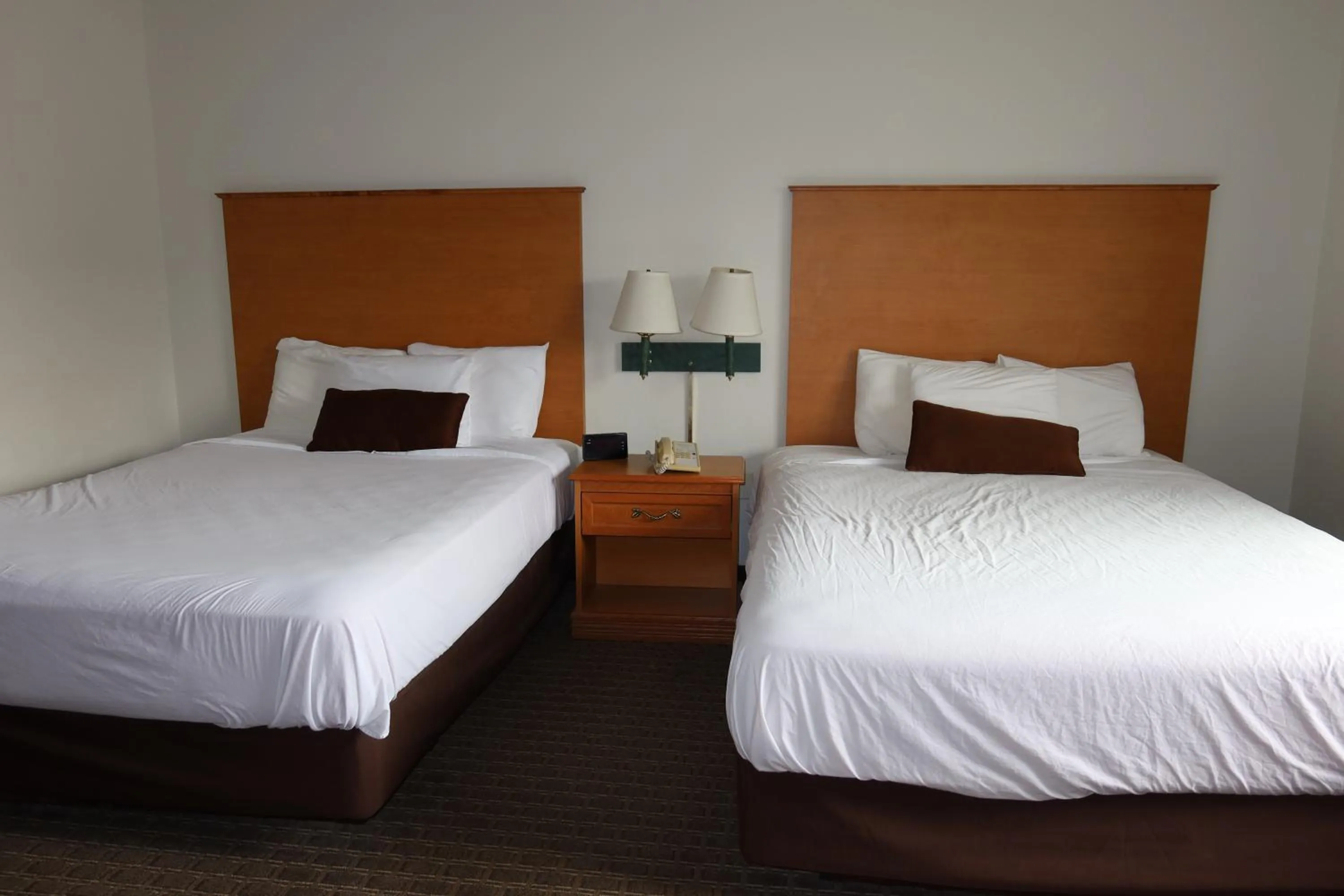 Bed in Americas Best Value Inn