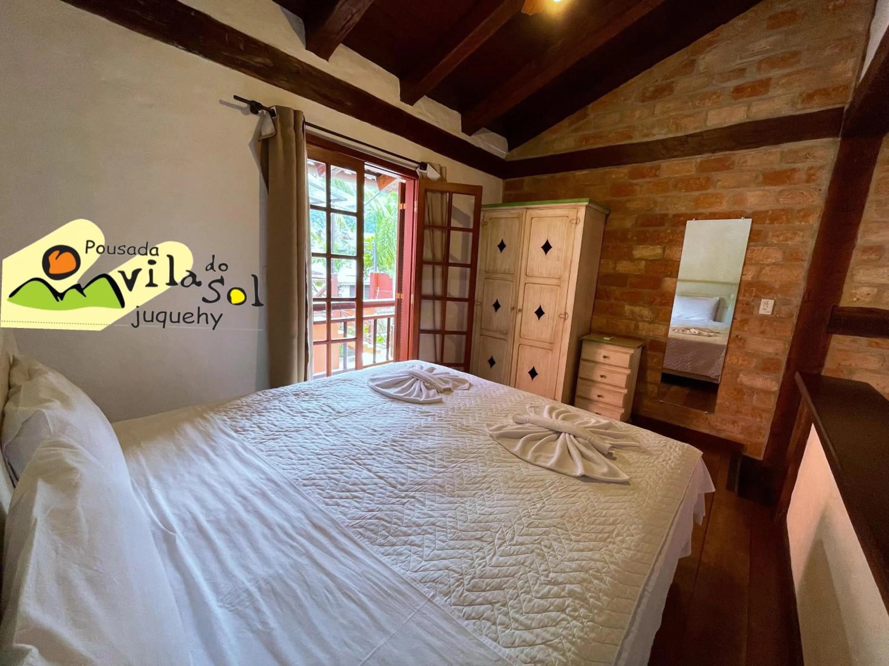 Bed in Pousada Vila do Sol Juquehy