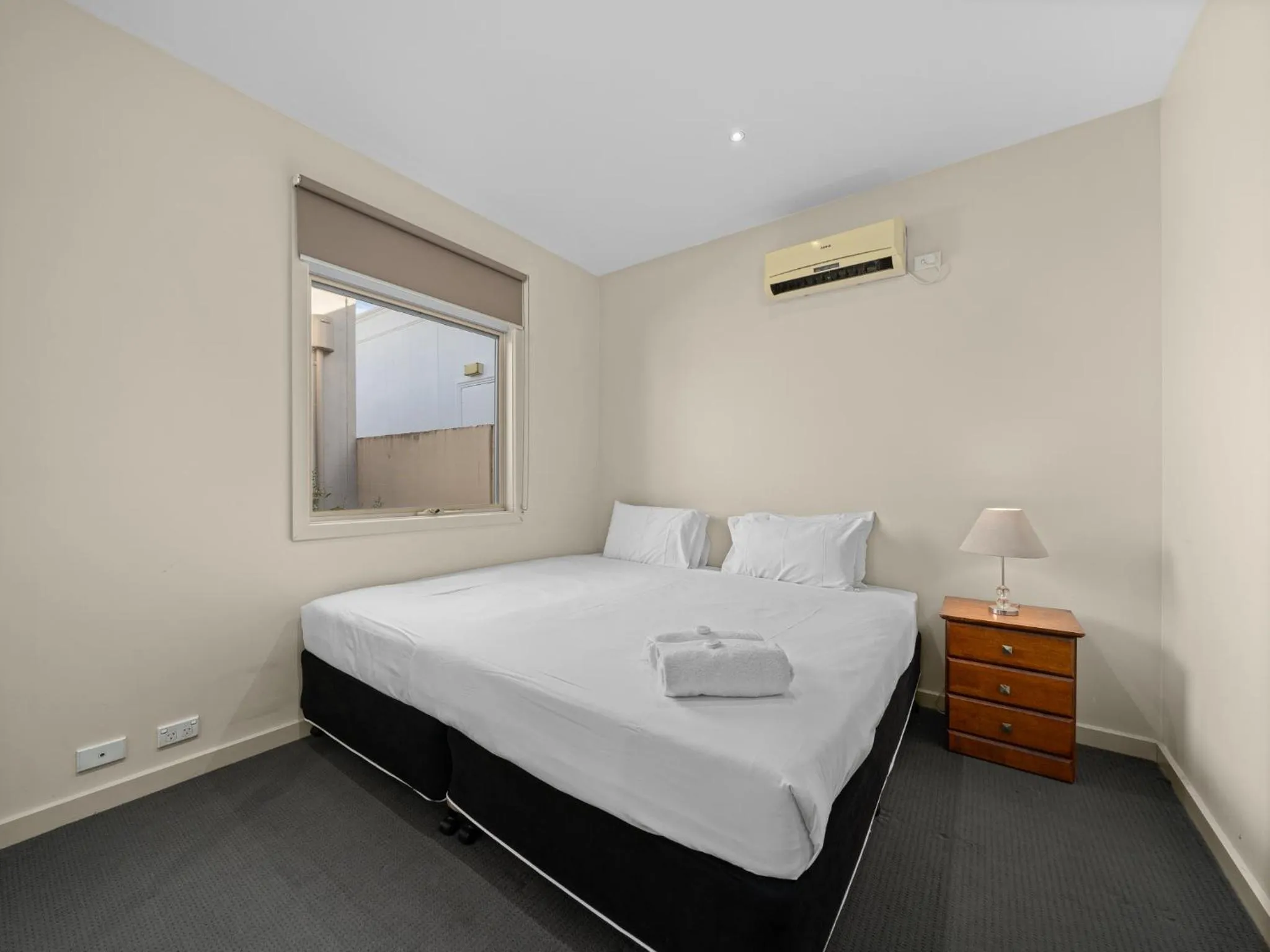 Bed in Central Shepparton Apartments