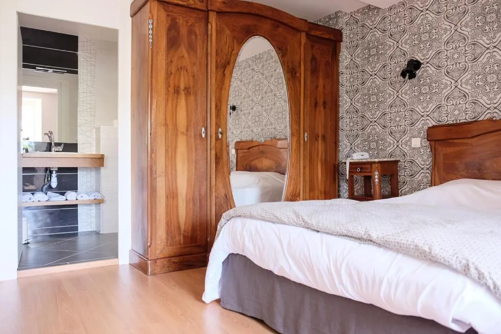 Bed in hôtel Piellenia