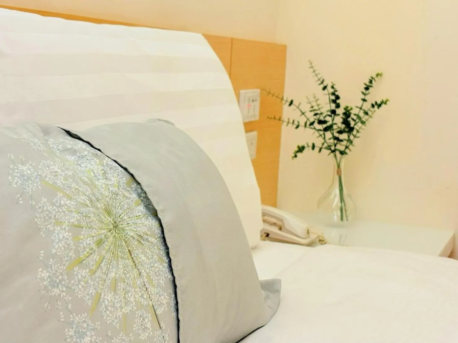 Bed in Wemeet Hotel Taipei