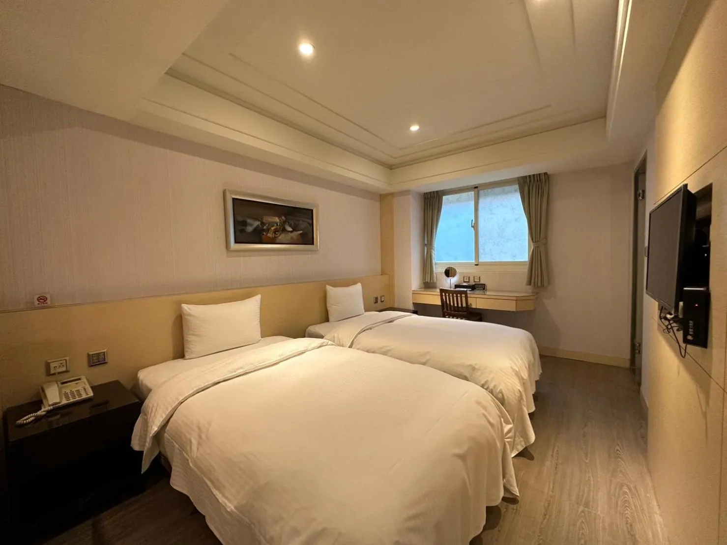 Bed in Link World Hotel