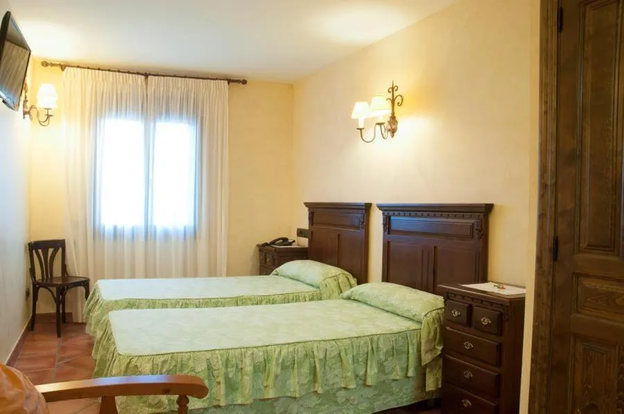 Bedroom, Bed in Hostal Rural Los Telares