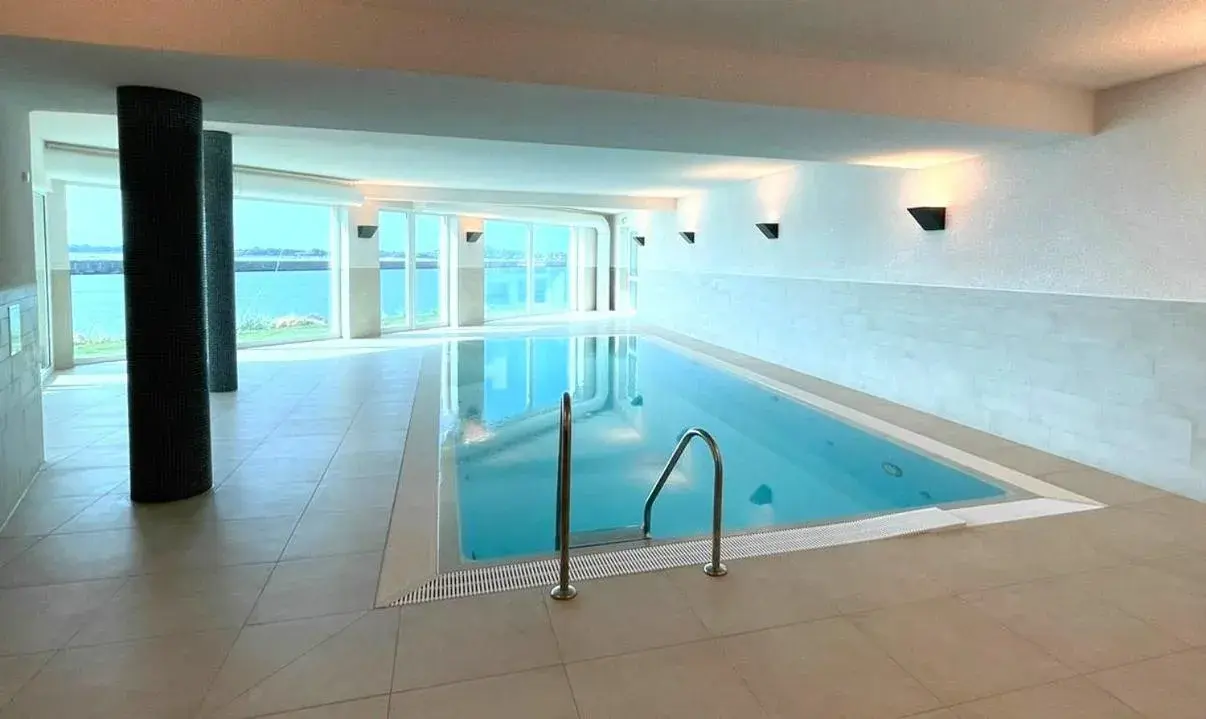 Ferienwohnung direkt am Meer mit Pool und Sauna, Strand fußläufig erreichbar, barrierefrei Ferienwohnung direkt am Meer mit Pool und Sauna, Strand fußläufig erreichbar, barrierefrei